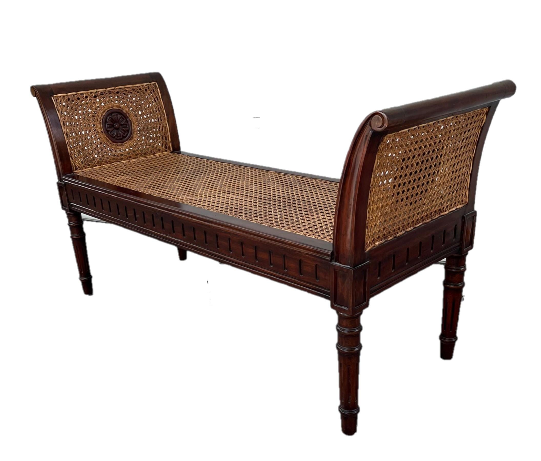 English Regency Style mahogany caned window bench / hall bench ca. 1900

Elegant Regency style mahogany caned window bench in neoclassical taste.
Both sides have scrolled ends with carved rosettes on turned legs. This delightful
bench is built