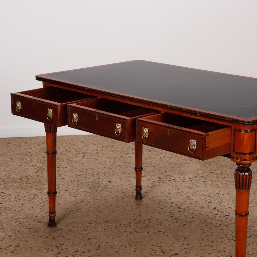 English Regency style mahogany leather top writing desk C 1950 In Good Condition In Philadelphia, PA