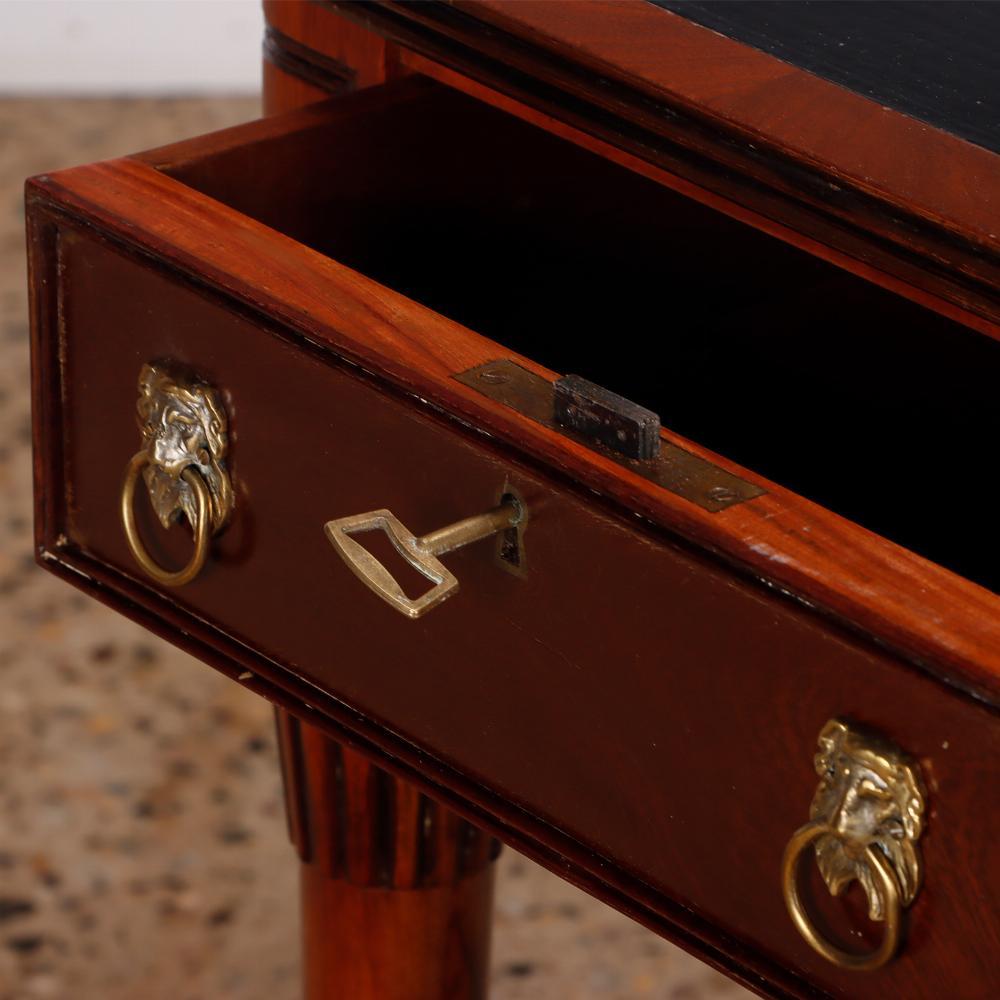 Mid-20th Century English Regency style mahogany leather top writing desk C 1950