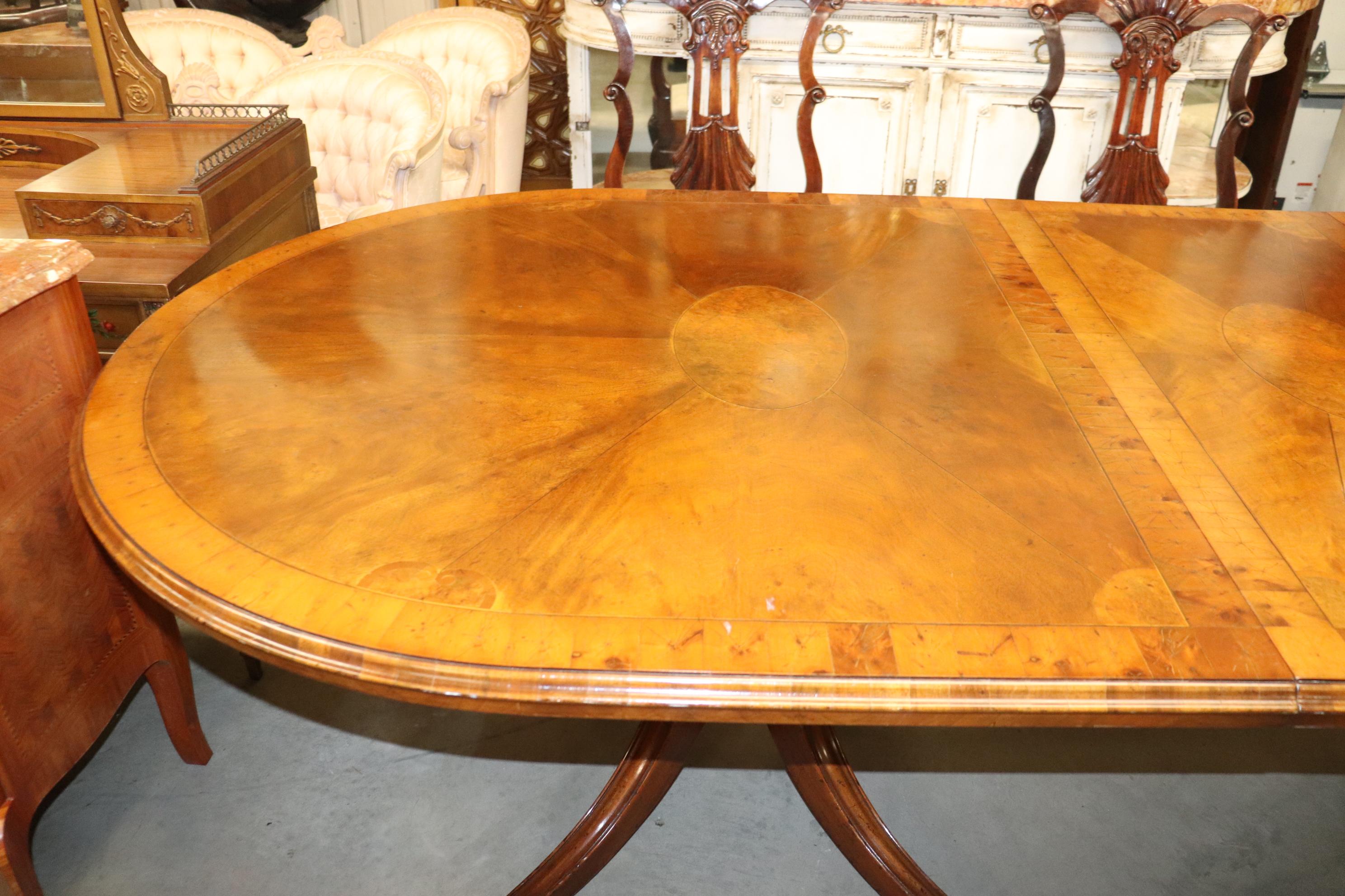 Late 20th Century English Regency Style Oyster Burled Inlaid Walnut Dining Table with Two Leaves 