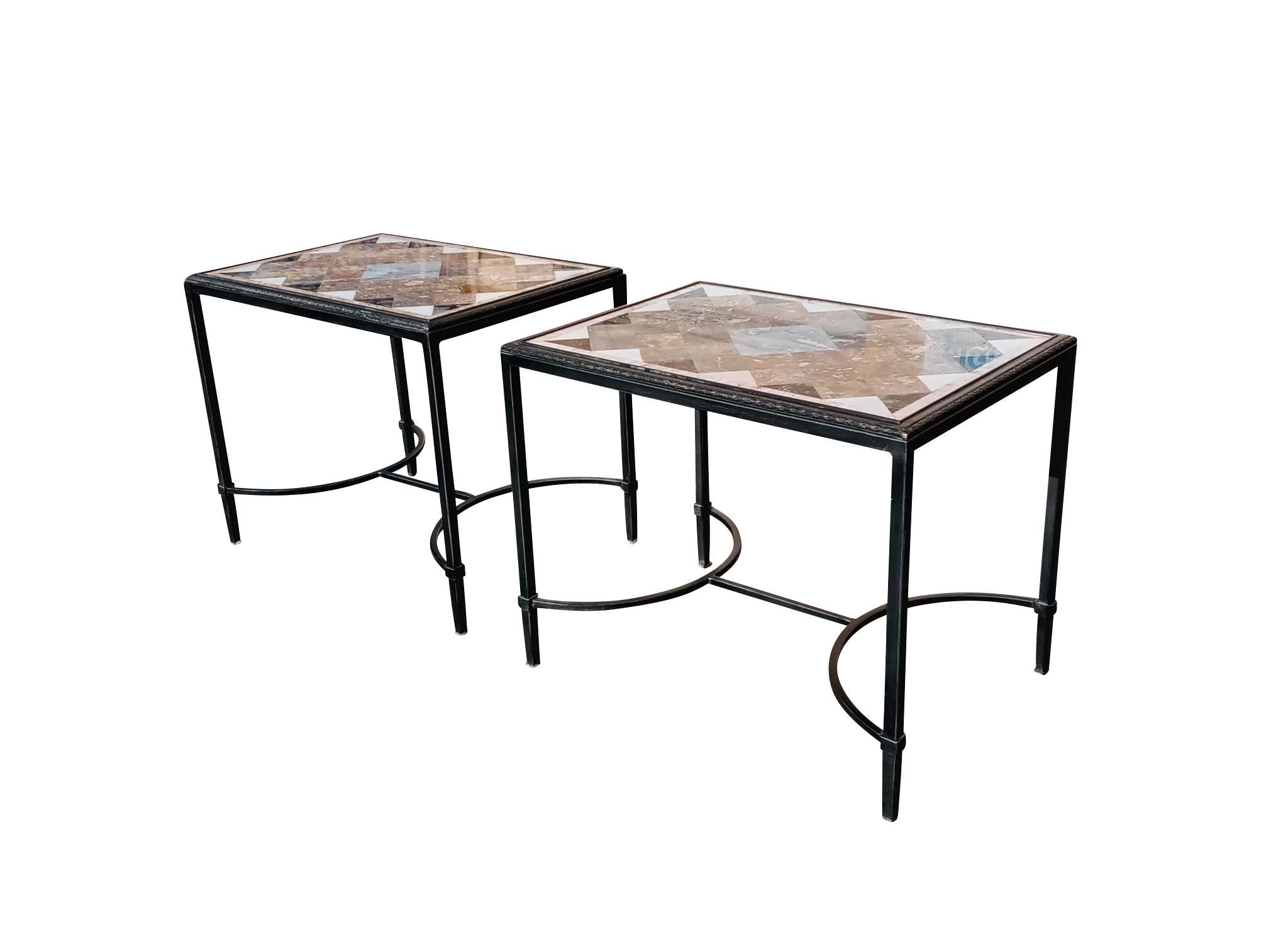 Based on English Regency design, these small cocktail or side tables offer striking lozenge pattern specimen marble tops and verdigris bronze on enameled iron frames. The tables have silm tapered legs joined by a center stretcher. These elegant