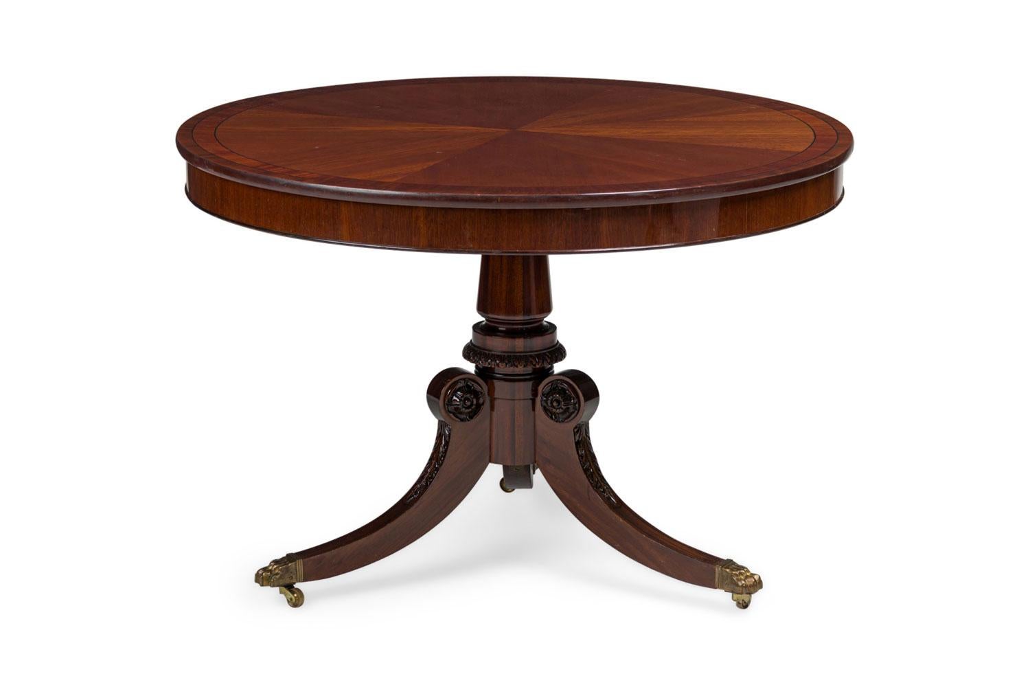 Carved English Regency style Round Center Table For Sale