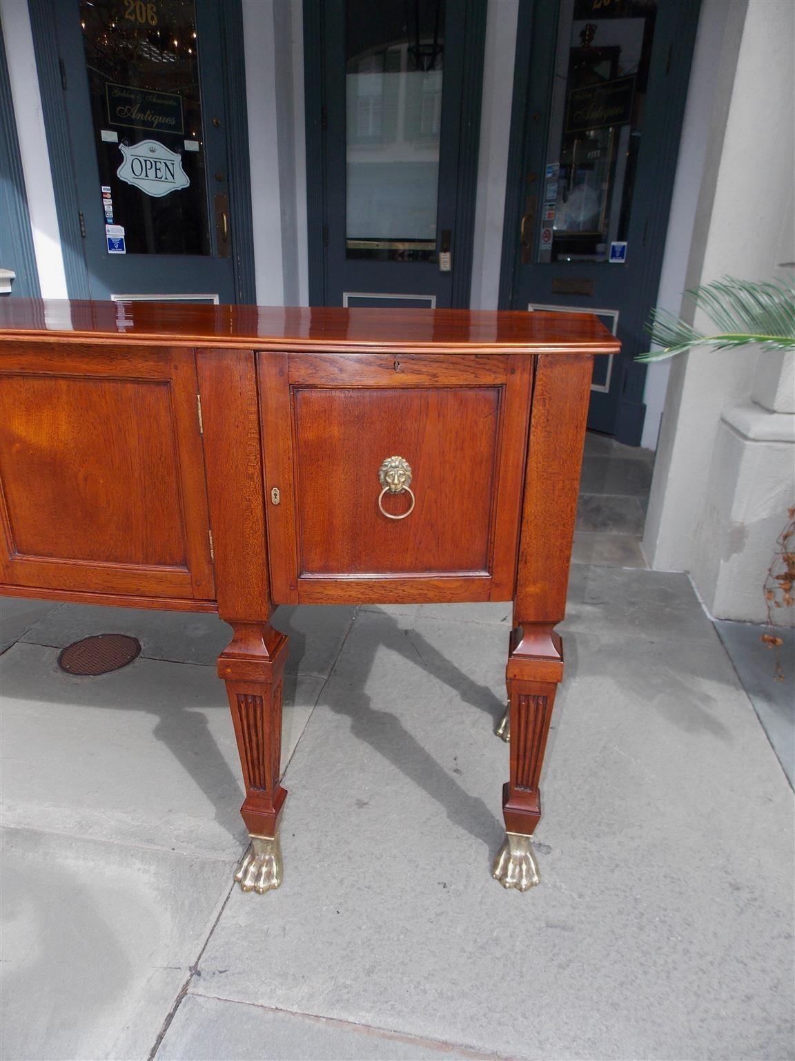 Late 19th Century English Regency Style Teak Bow Front and Brass Hairy Paw Sideboard, Circa 1870 For Sale