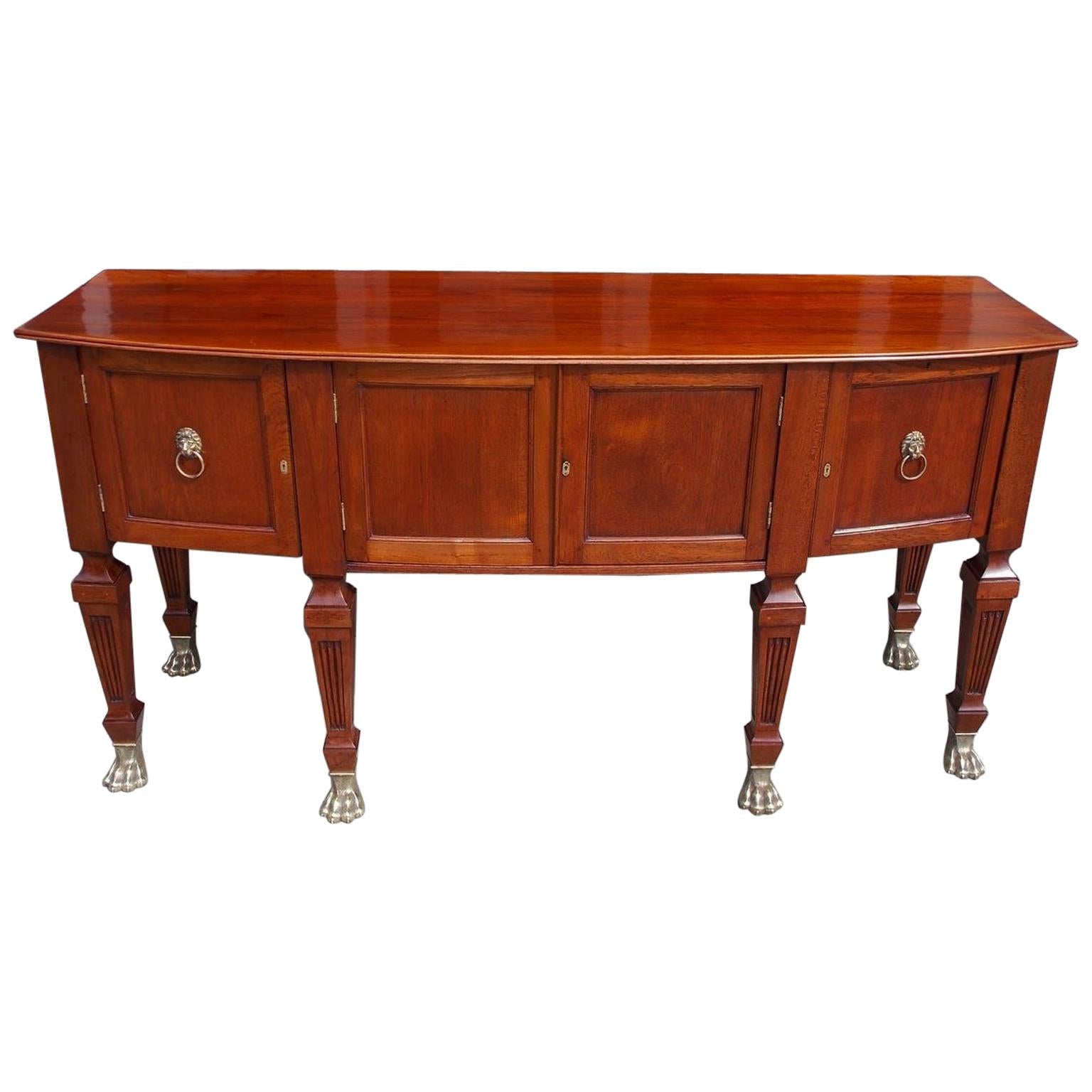 English Regency Style Teak Bow Front and Brass Hairy Paw Sideboard, Circa 1870 For Sale