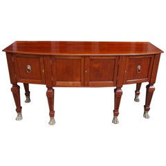 English Regency Style Teak Bow Front and Brass Hairy Paw Sideboard, Circa 1870