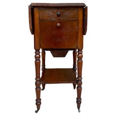 English Regency Walnut Table with Wings and Wheels, 1920s