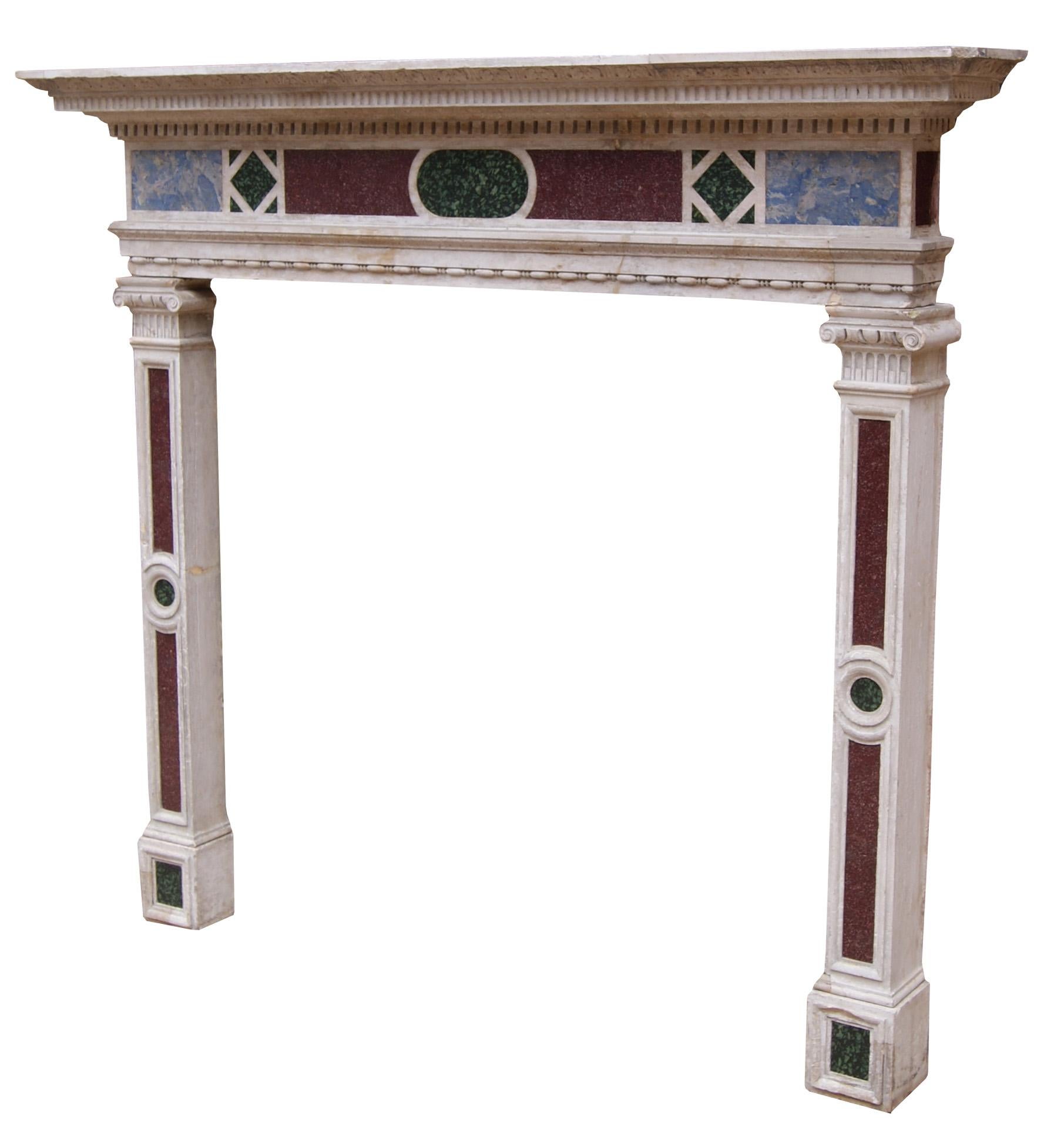 A 19th century Italianate style fireplace carved from Istrian stone with semi-precious inlaid marbles. The frieze panel inlaid with Egyptian Imperial red Porphyry, Ancient Green Peloponnesian Porphyry and lazurite, supported on similarly panelled