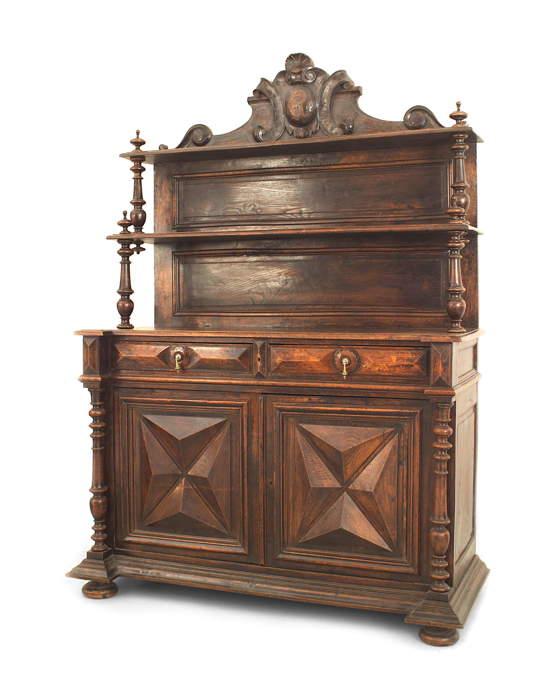 English Renaissance-style (18/19th Century) walnut hutch cabinet with 2 shelves under a carved pediment top with 2 drawers over 2 diamond carved doors on the base
