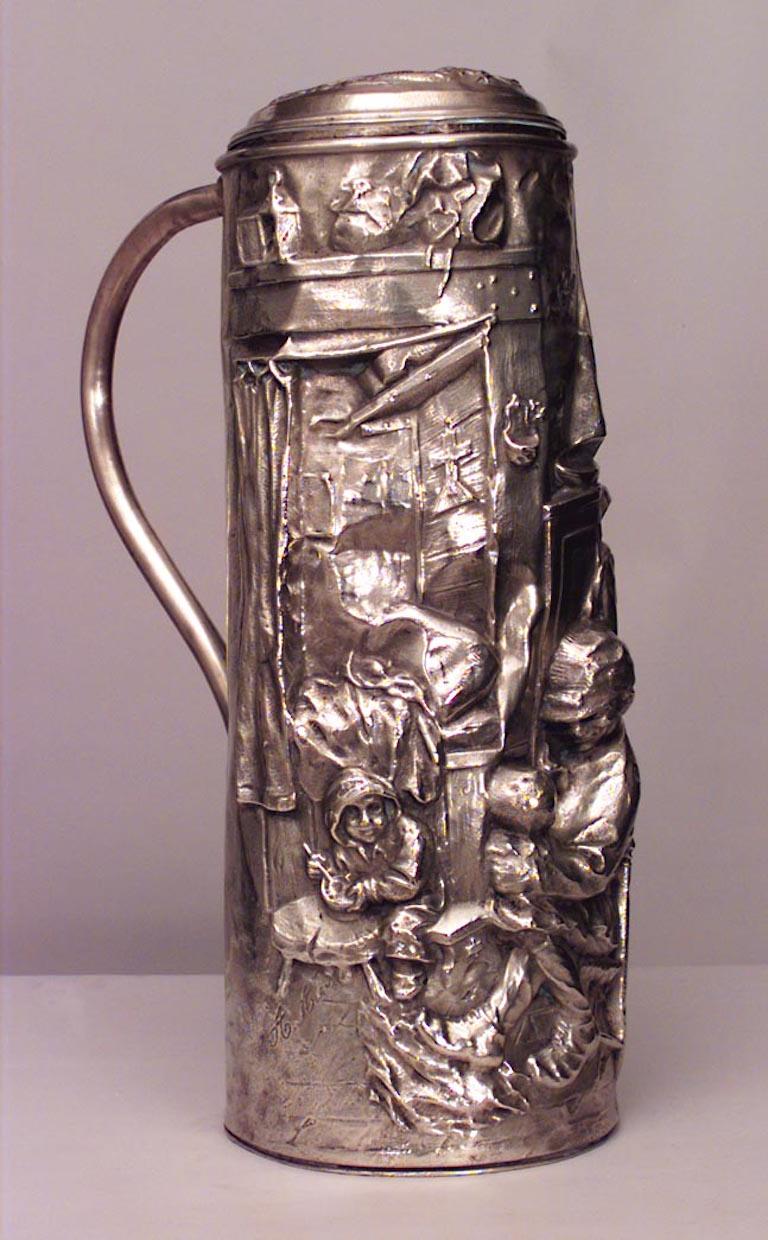 English Renaissance-style (19/20th Centurey) hammered brass stein shaped umbrella stand with cover.
