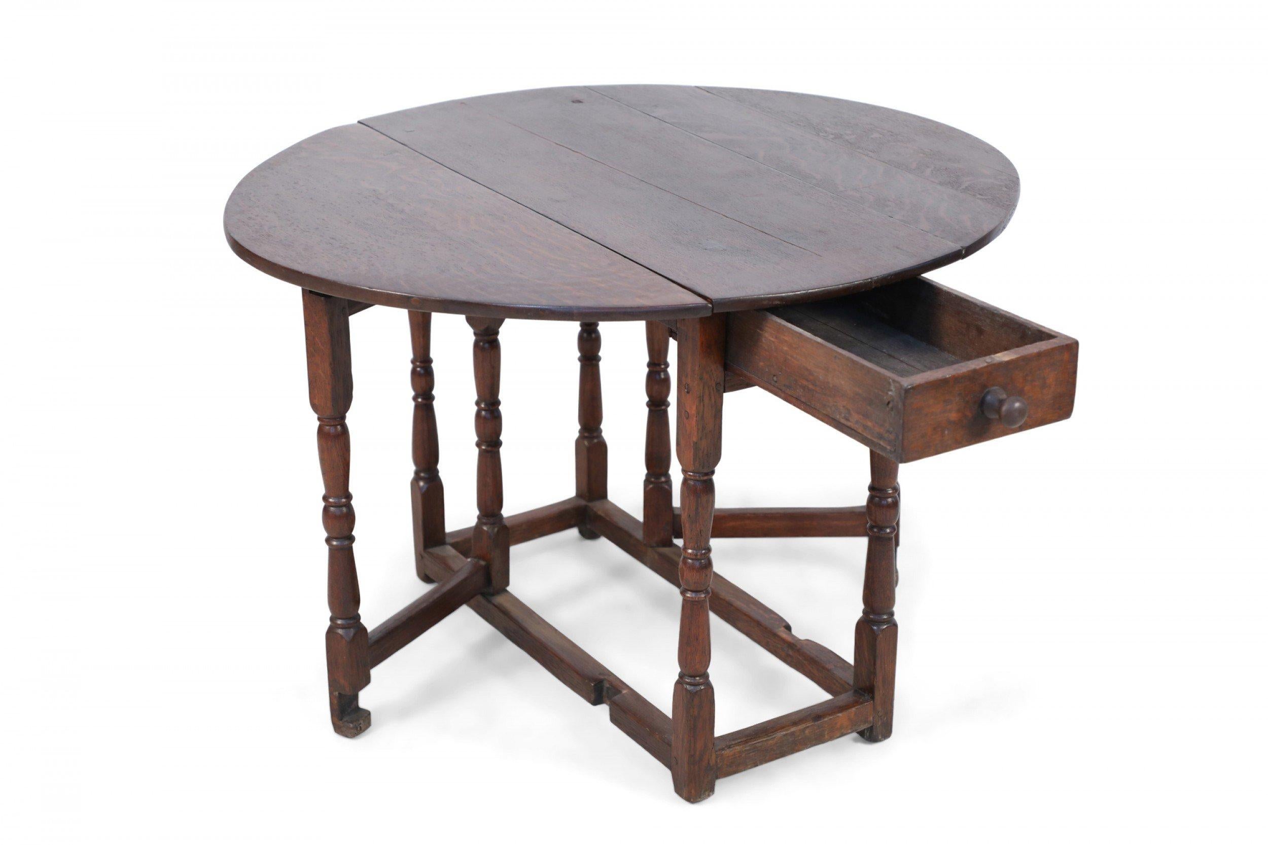 English Renaissance-Style Walnut Drop Leaf Center Table For Sale 4