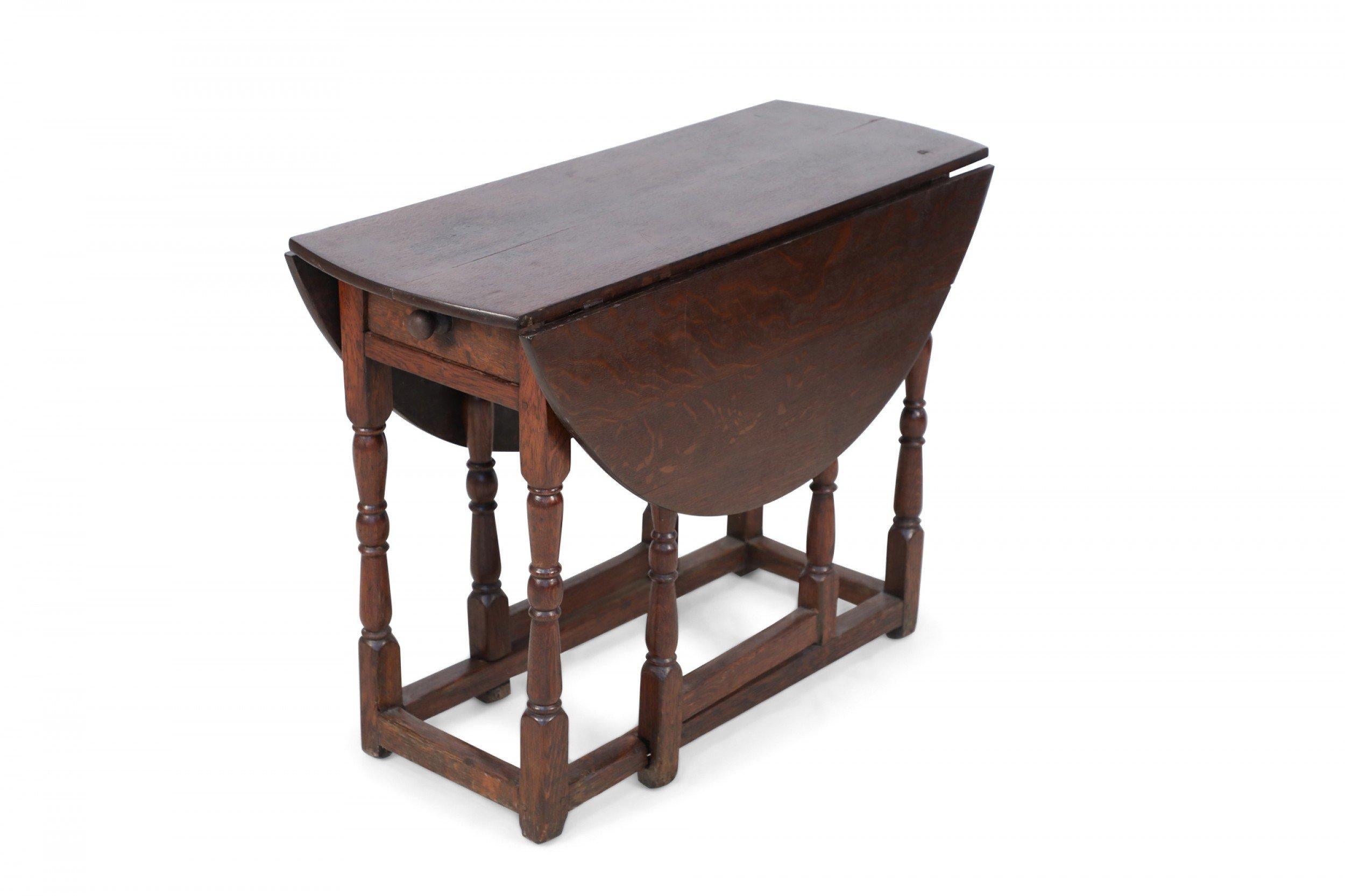 British English Renaissance-Style Walnut Drop Leaf Center Table For Sale