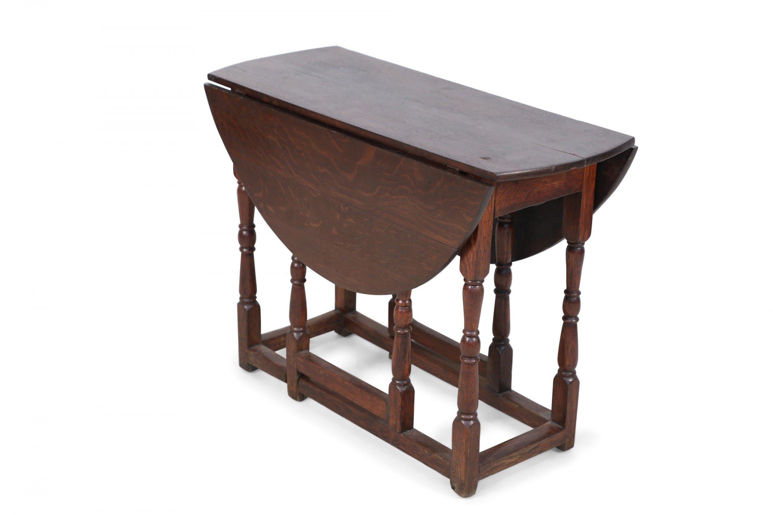 Hand-Crafted English Renaissance-Style Walnut Drop Leaf Center Table For Sale