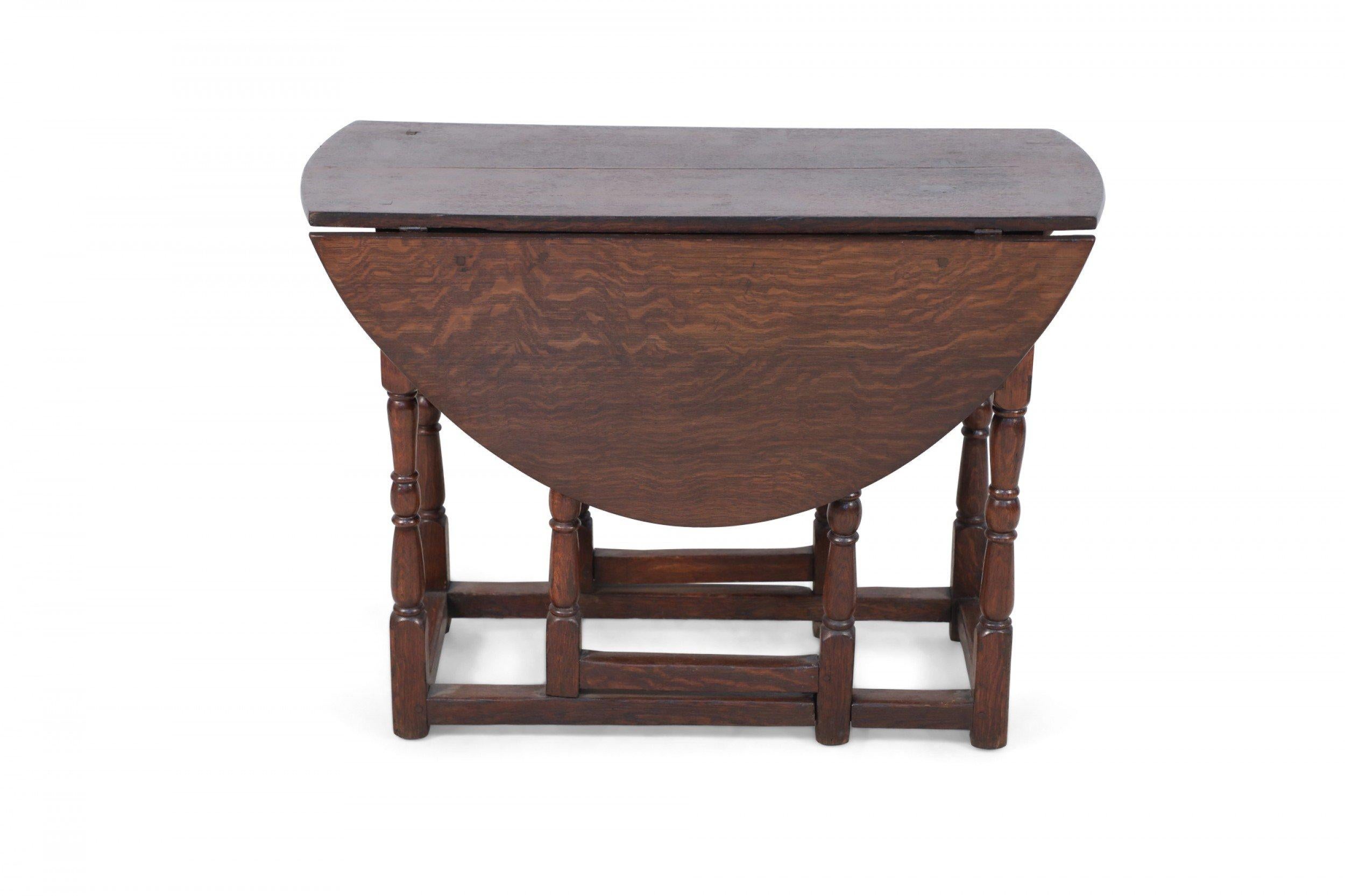 Wood English Renaissance-Style Walnut Drop Leaf Center Table For Sale