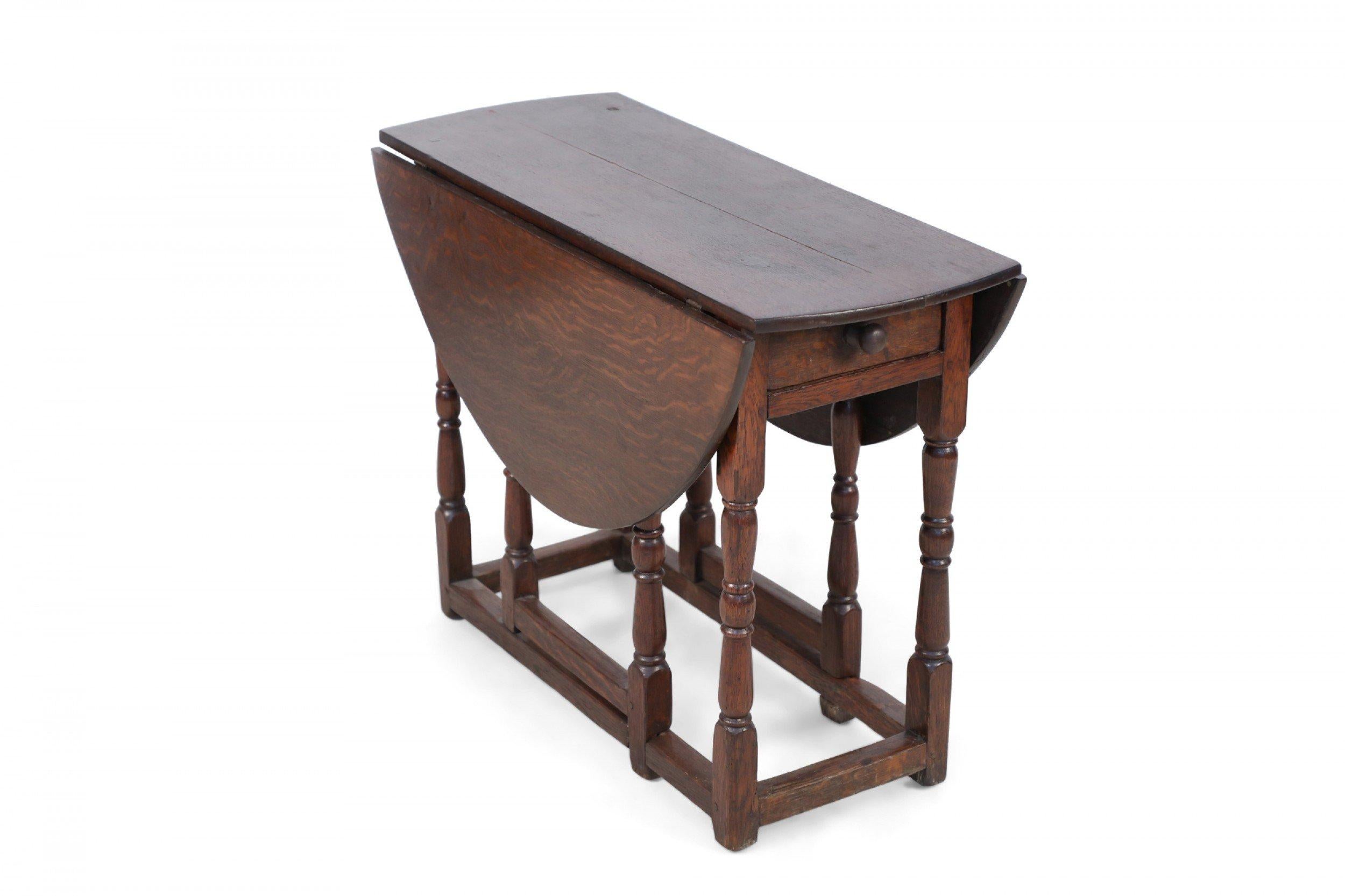 English Renaissance-Style Walnut Drop Leaf Center Table For Sale 1