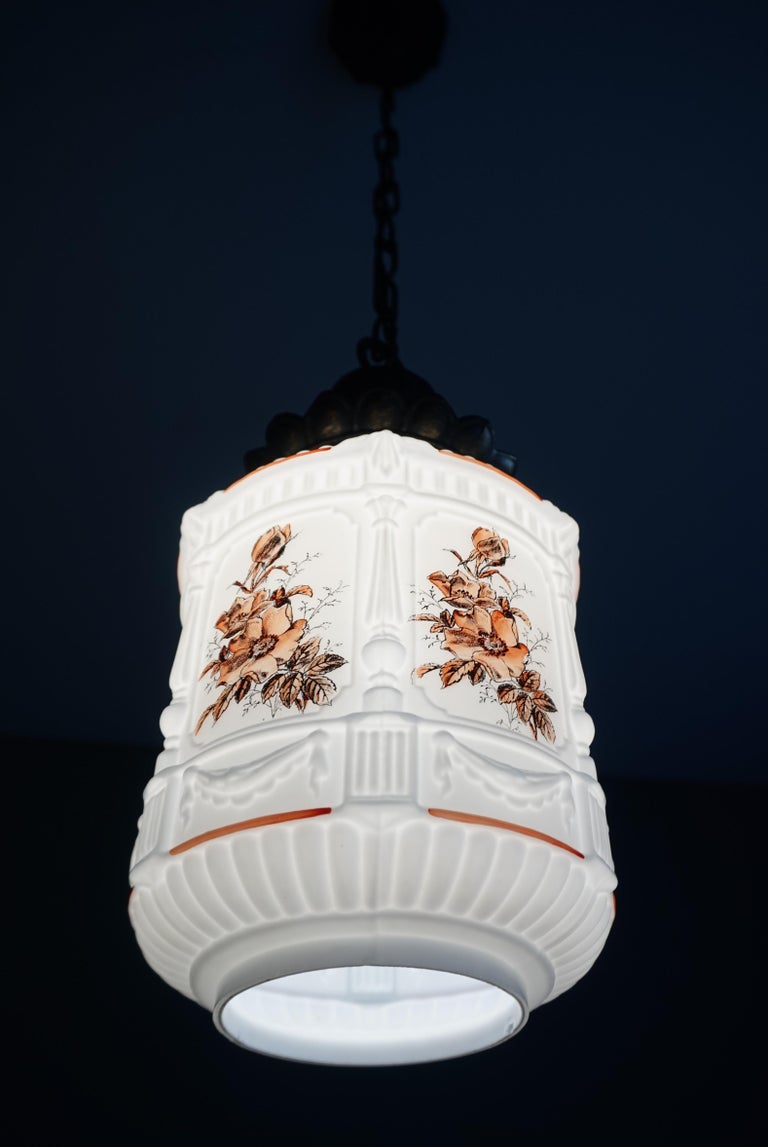 Patinated English Roman Classical St. Flowers Decorated Opaline / Milk Glass Pendant Light For Sale
