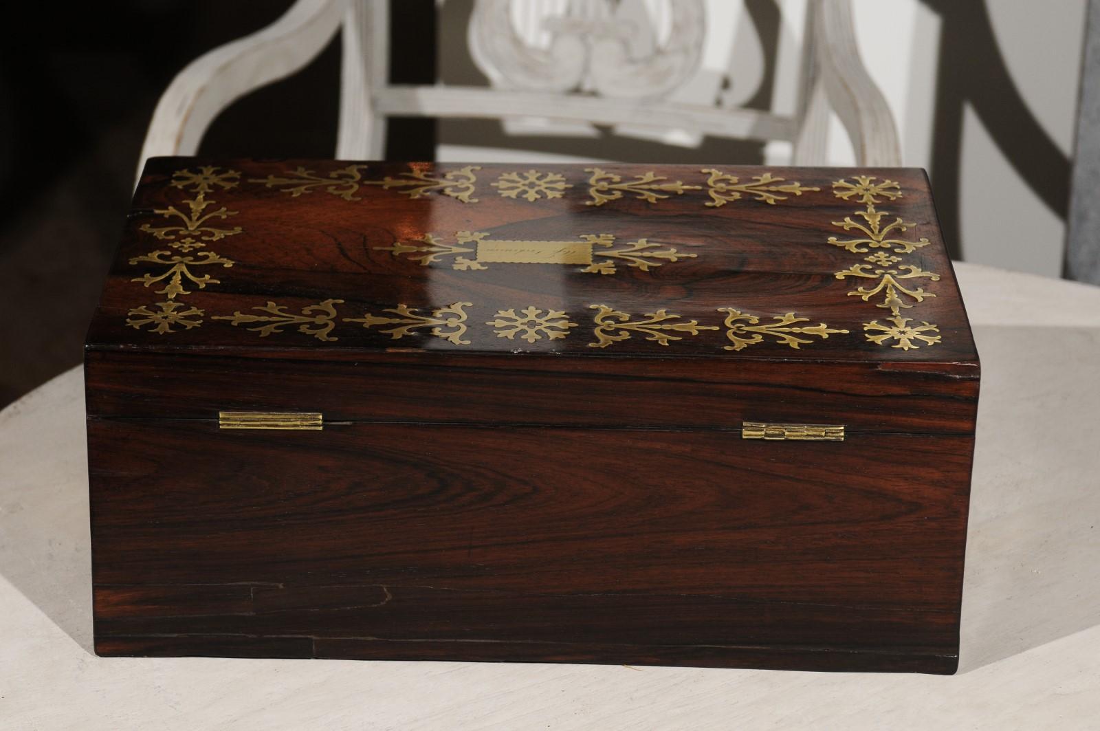 19th Century English Rosewood Box with Intricate Brass Motifs and Black Leather Writing Area