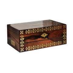 Antique English Rosewood Box with Intricate Brass Motifs and Black Leather Writing Area