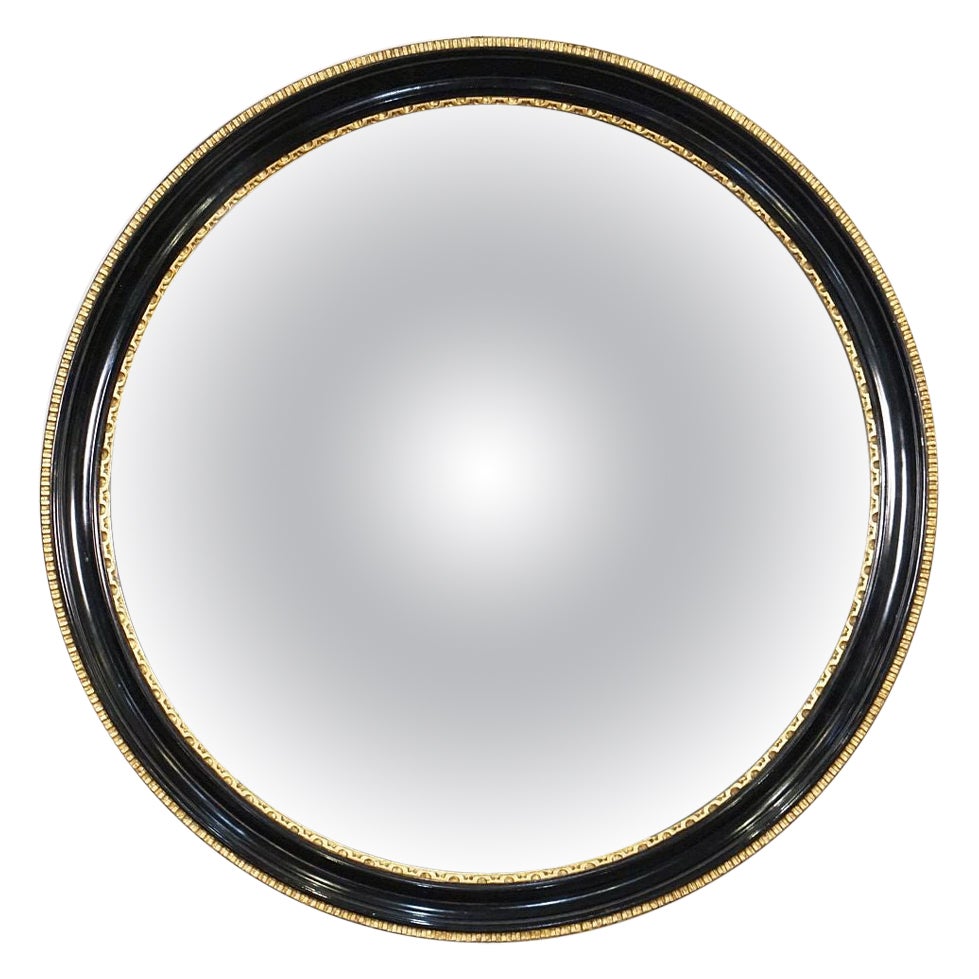 Miroir convexe anglais rond en ébène encadré noir et or (diamètre 18 1/2)