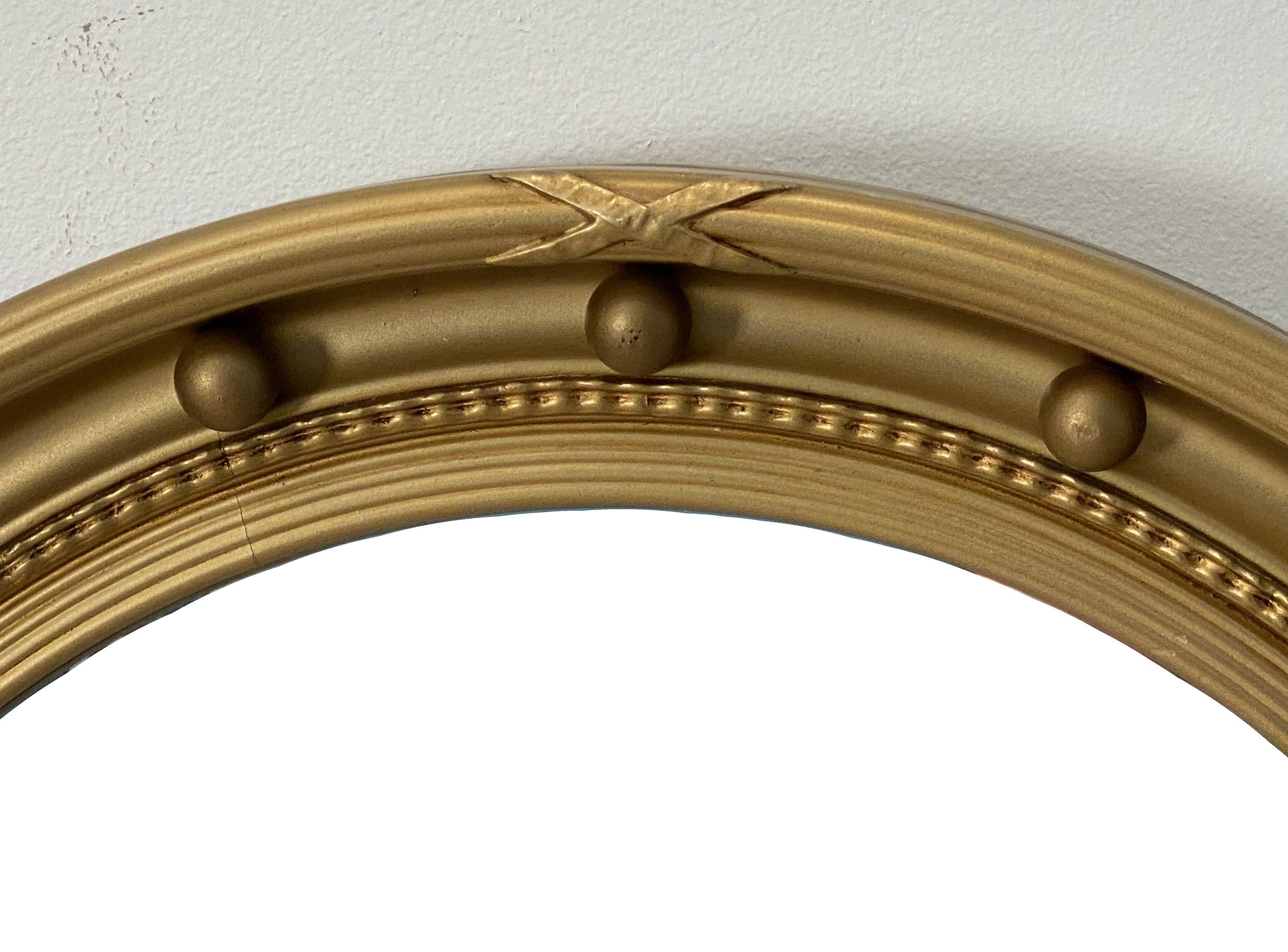 round gilt mirror