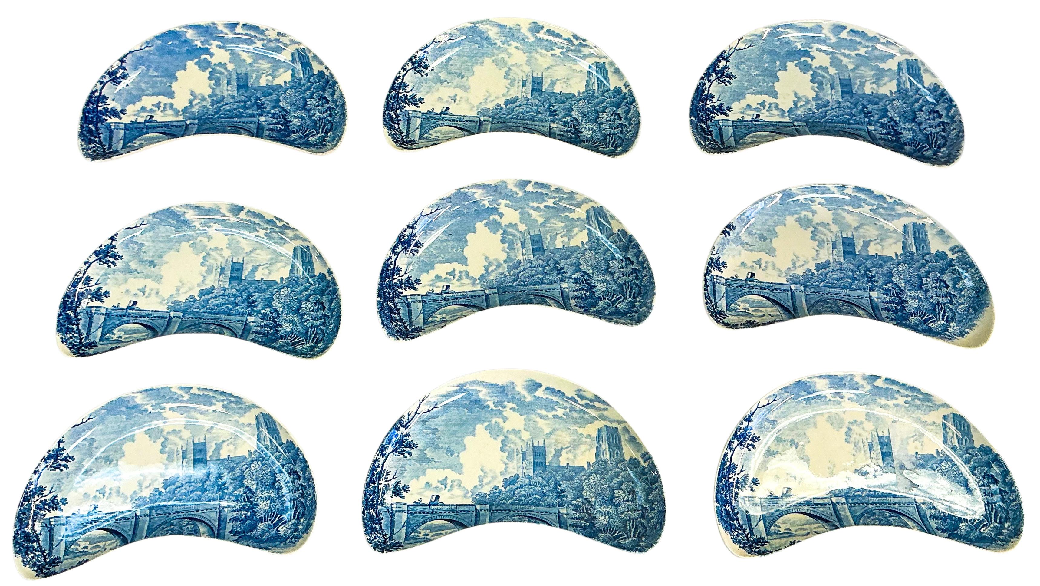 This is a lovely set of blue and white Royal Worcester Palissy pottery . There are nine bone dishes having a kidney shape. They depict the English Avon scenes from 1790. They are all in very good condition and marked.