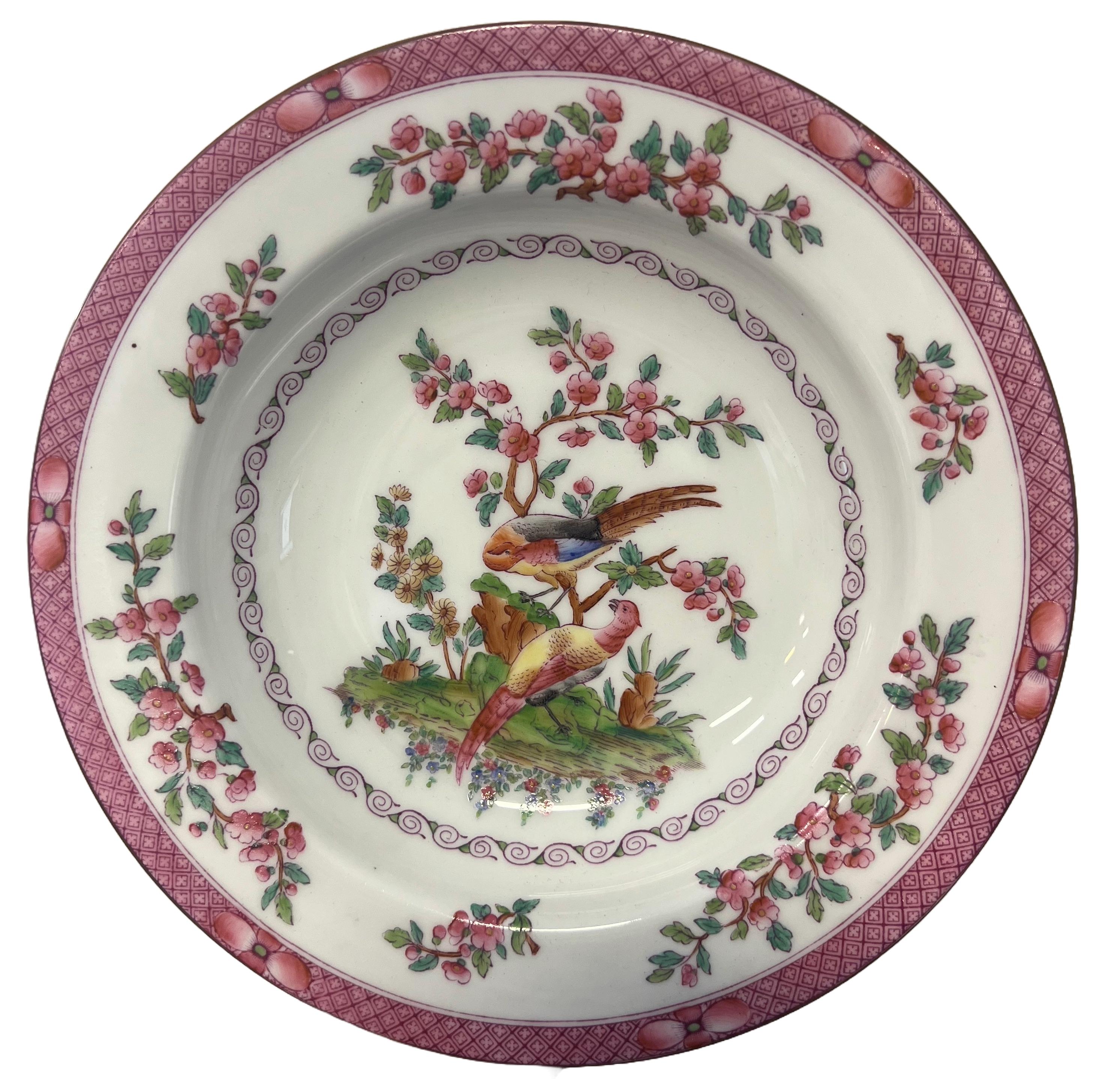 Eleven English Royal Worcester Porcelain Plated Retailed by Tiffany & Co, Circa 1900
Having a white ground base with pink borders and accents depicting birds sitting on a branch 
The rear marked Tiffany & Co New York & Royal Worcester England and