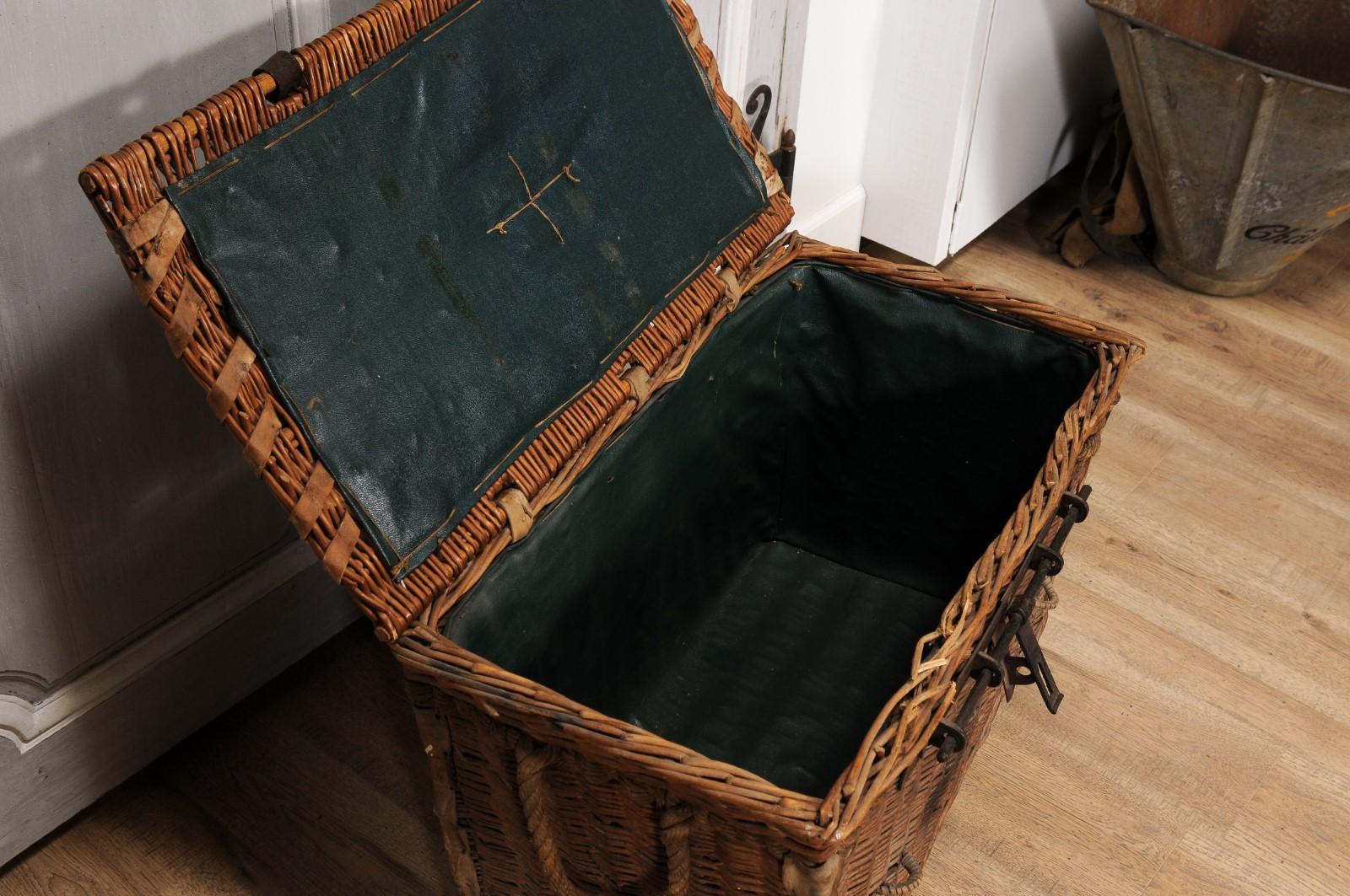 Metal English Rustic 1930s Wicker Trunk with Iron Hardware and Lateral Handles For Sale