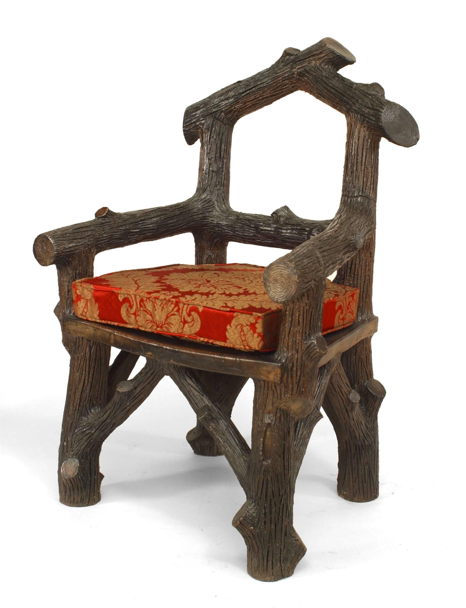 English Victorian Rustic style glazed brown terra cotta arm chair with faux twig design with open pediment shaped back.
