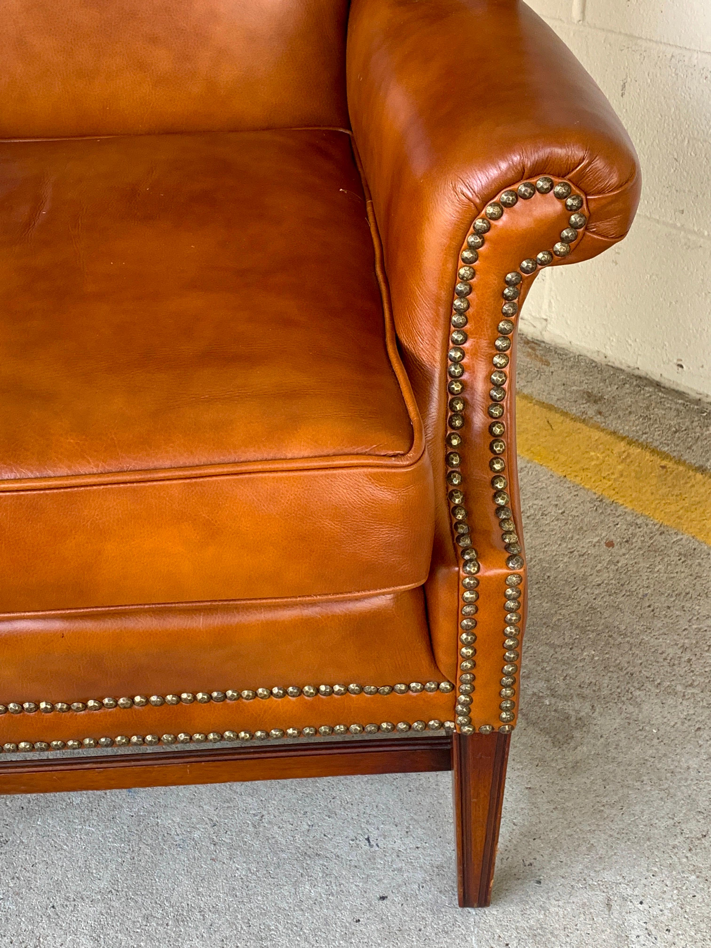 20th Century English Saddle Leather Mahogany Wingback Chair For Sale