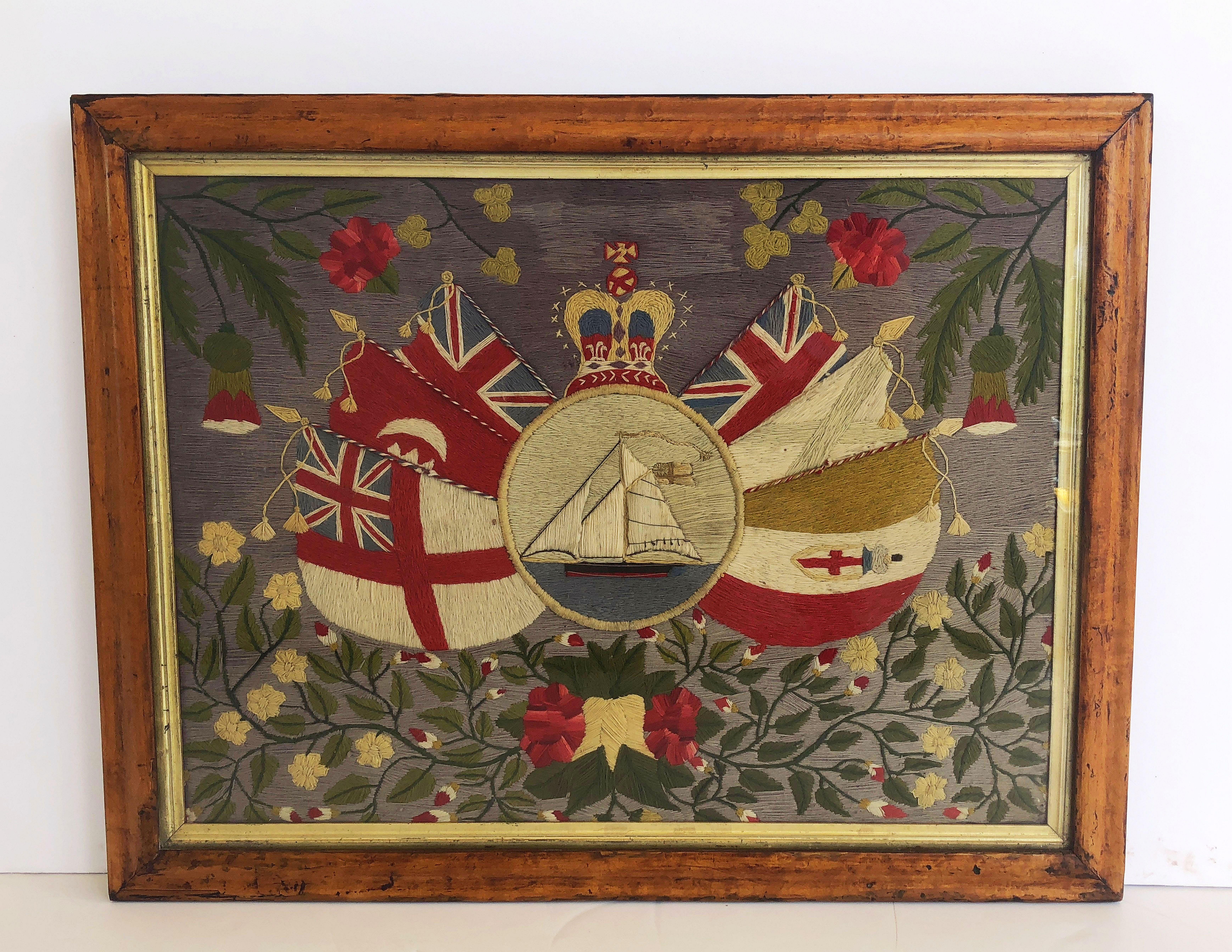 A 19th century English naval sailor's woolwork (or woolie) depicting a sailing ship or wooden frigate and the flags of the participants during the Crimean War (1853-1856), framed in bird's-eye maple and under glass.

Includes the Union Jack flag of