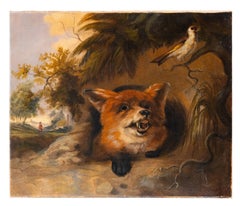 Fox trying to hunt a goldfinch