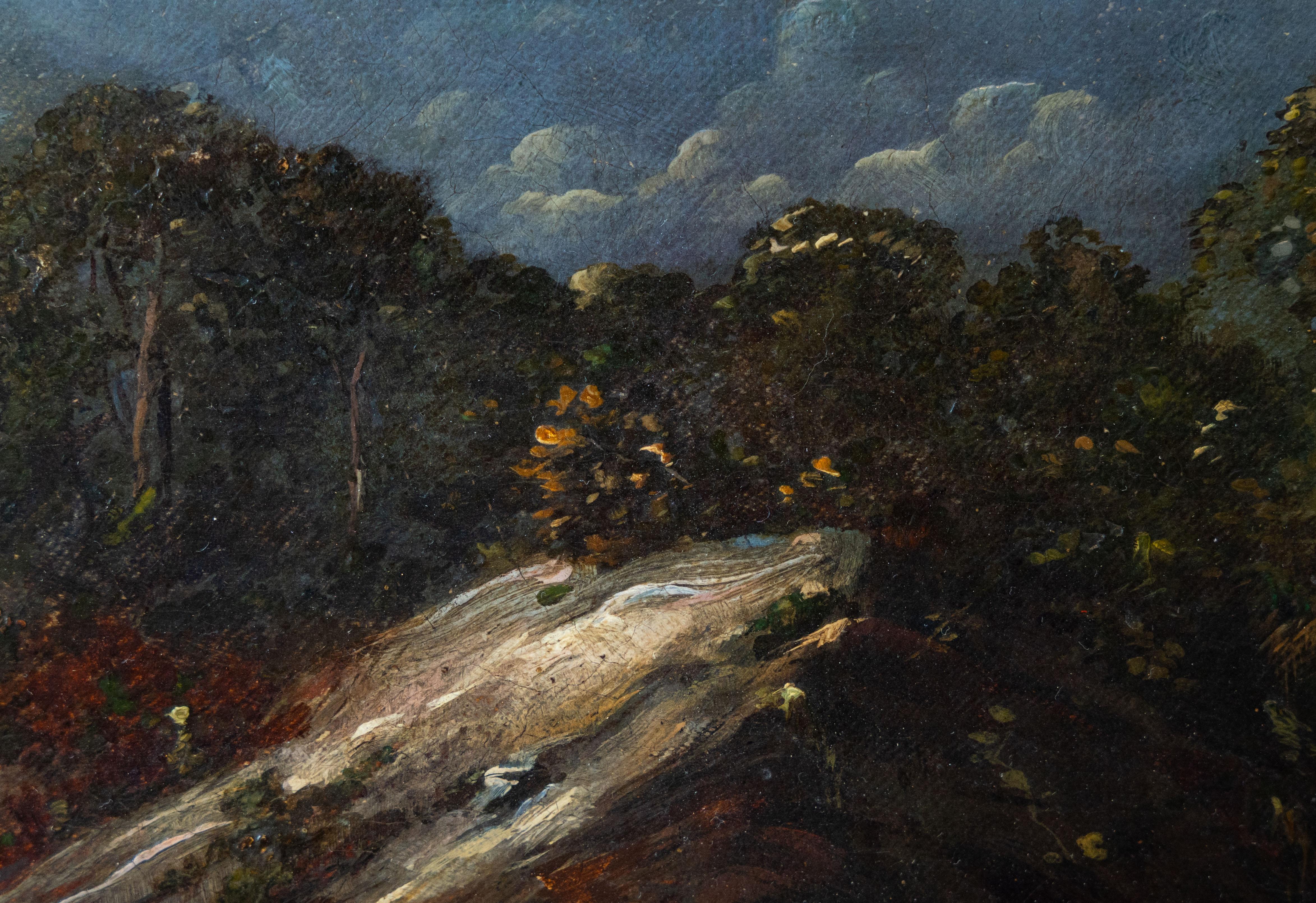 In this serene and atmospheric 19th-century British School landscape, a tranquil lake stretches across the centre of the canvas, its surface softly reflecting the overcast sky and the imposing mountains that rise on all sides. The composition