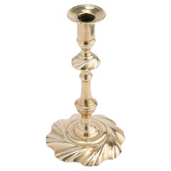 English seam cast brass swirl base candlestick, 1750