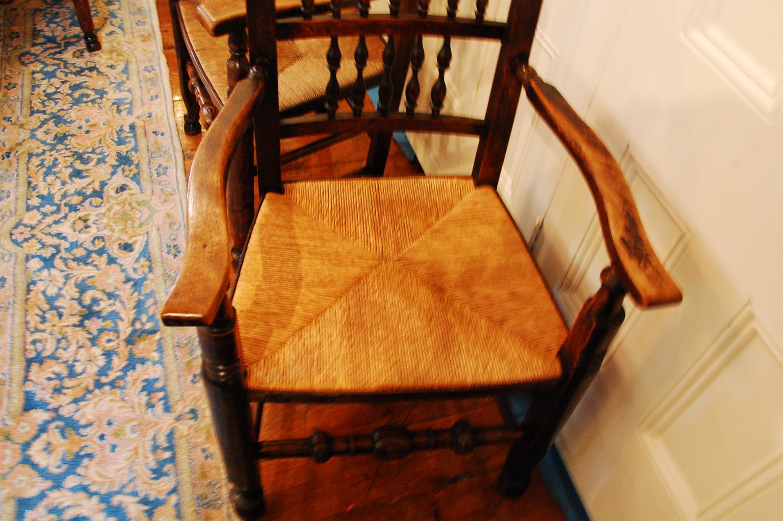19th Century English Set of Eight  Elm Spindleback Chairs Early 19th C Two Arms and Six Sides For Sale