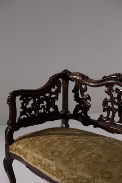 vintage English settee in wood and fabric