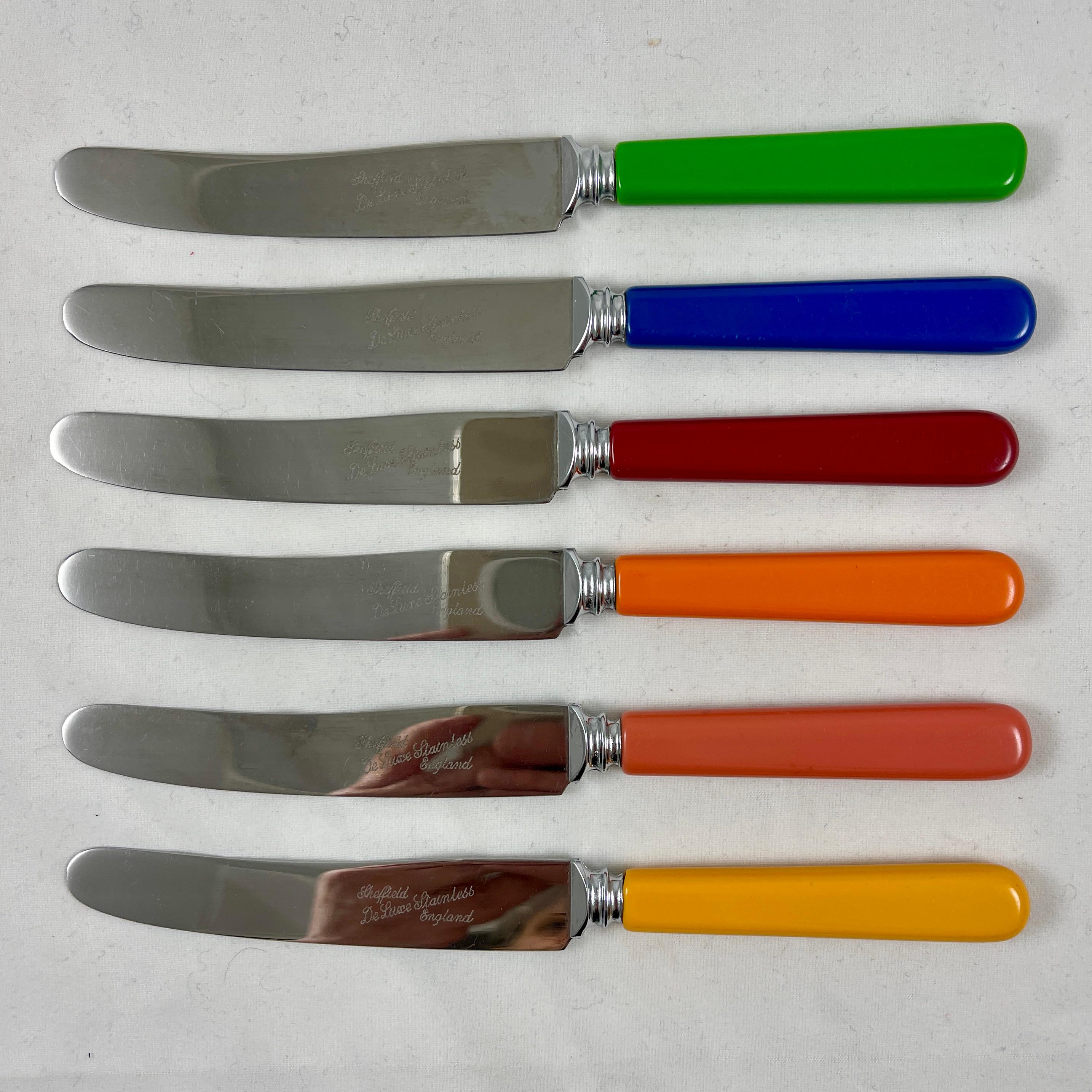 A set of six Bakelite handled rainbow colored spreaders in the original fitted box, Sheffield, England, circa 1940s.

A well made knife set with Bakelite handles in green, blue, red, orange, salmon, and yellow. Perfect for spreading butter, soft