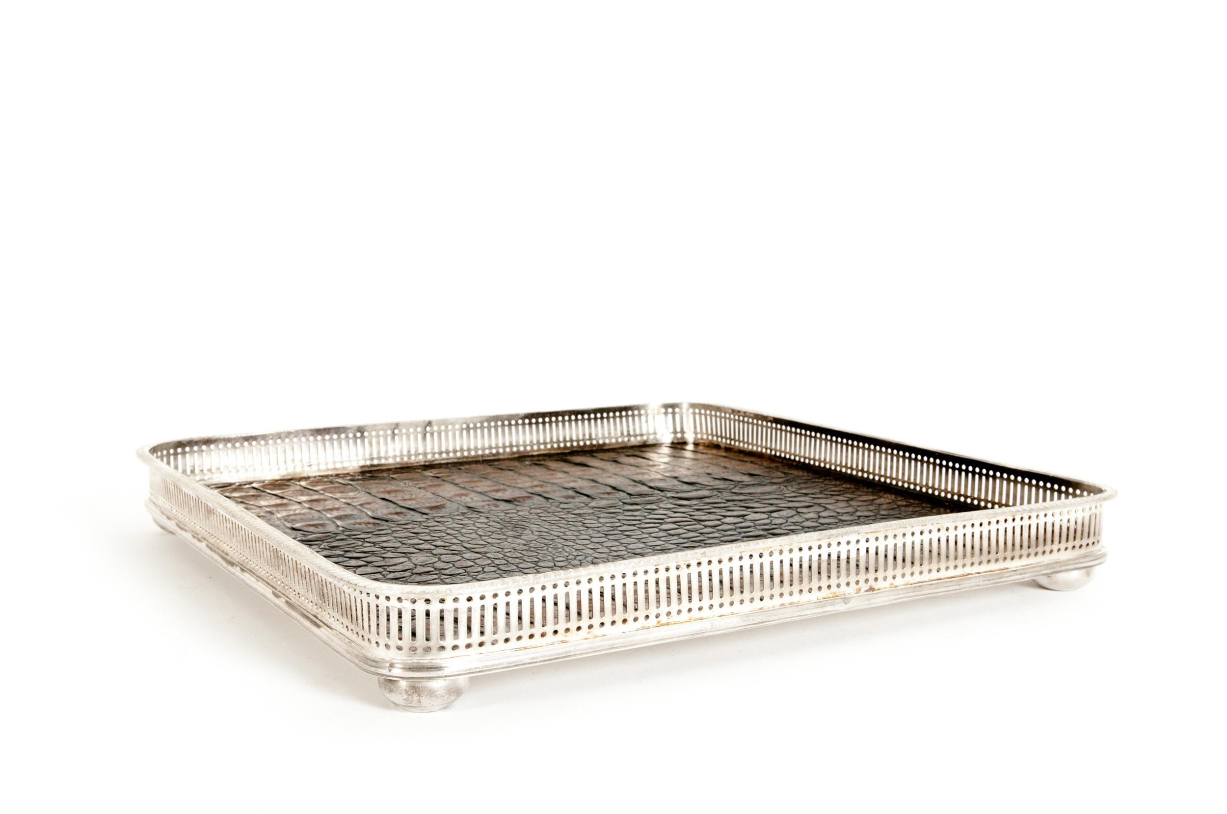 English sheffield silver plated crocodile interior barware / tableware serving footed gallery tray. The tray is in great condition with appropriate wear consistent with age / use. Maker's mark undersigned. The barware / serving tray is about 14
