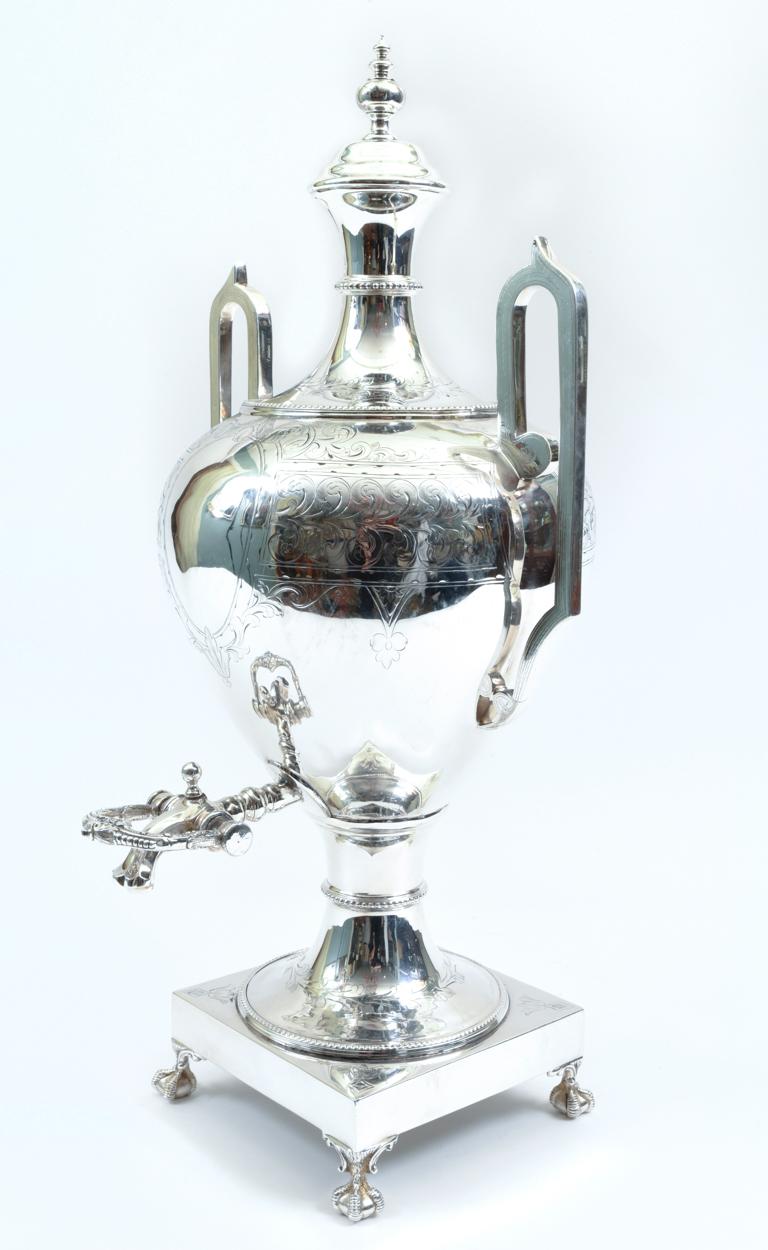 English Sheffield silver plated regency tableware tea / coffee serving samovar with exterior design details. The piece is in excellent antique condition with minor wear consistent with age and use, maker's mark undersigned. It measure about 21