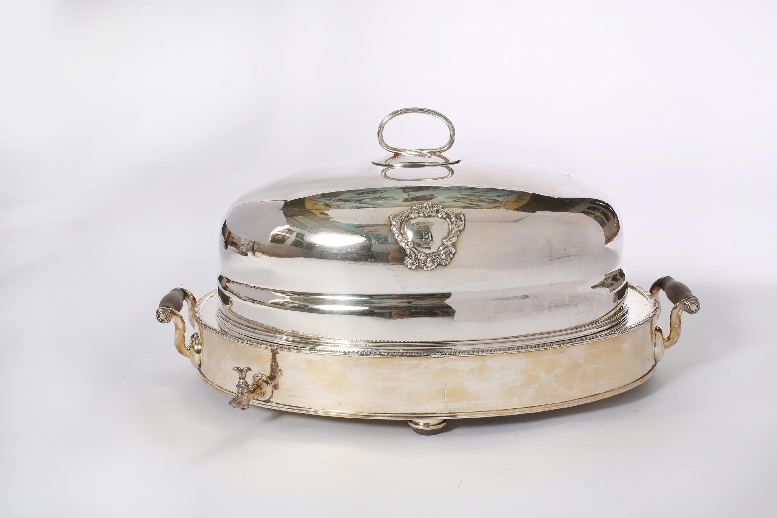 Impressive English Sheffield silver plated tableware meat dome service set with wooden side handles. The piece is in good vintage condition with wear appropriate to age / use. Maker's mark undersigned. The dome measures about 23 inches long x 14.5