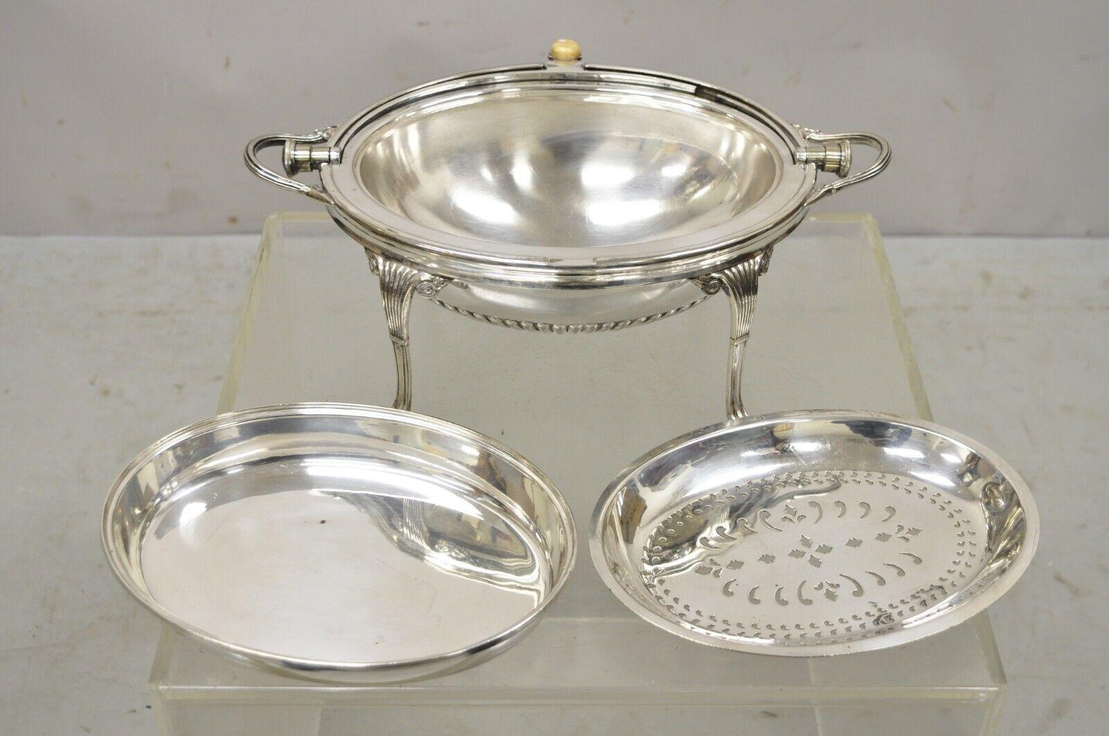 Antique English Sheffield Victorian Silver Plated Rotating Dome Serving Dish Warmer. Item features Revolving ribbed dome top, paw feet, twin handles. Circa Early 1900s. Measurements: 8.5