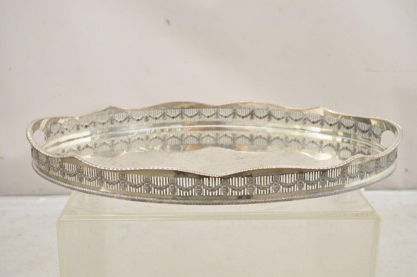 English Sheffield William Adams Silver Plated Pierced Drape Gallery Oval Tray with Handles. Circa Mid 20th Century. Measurements:  2.5