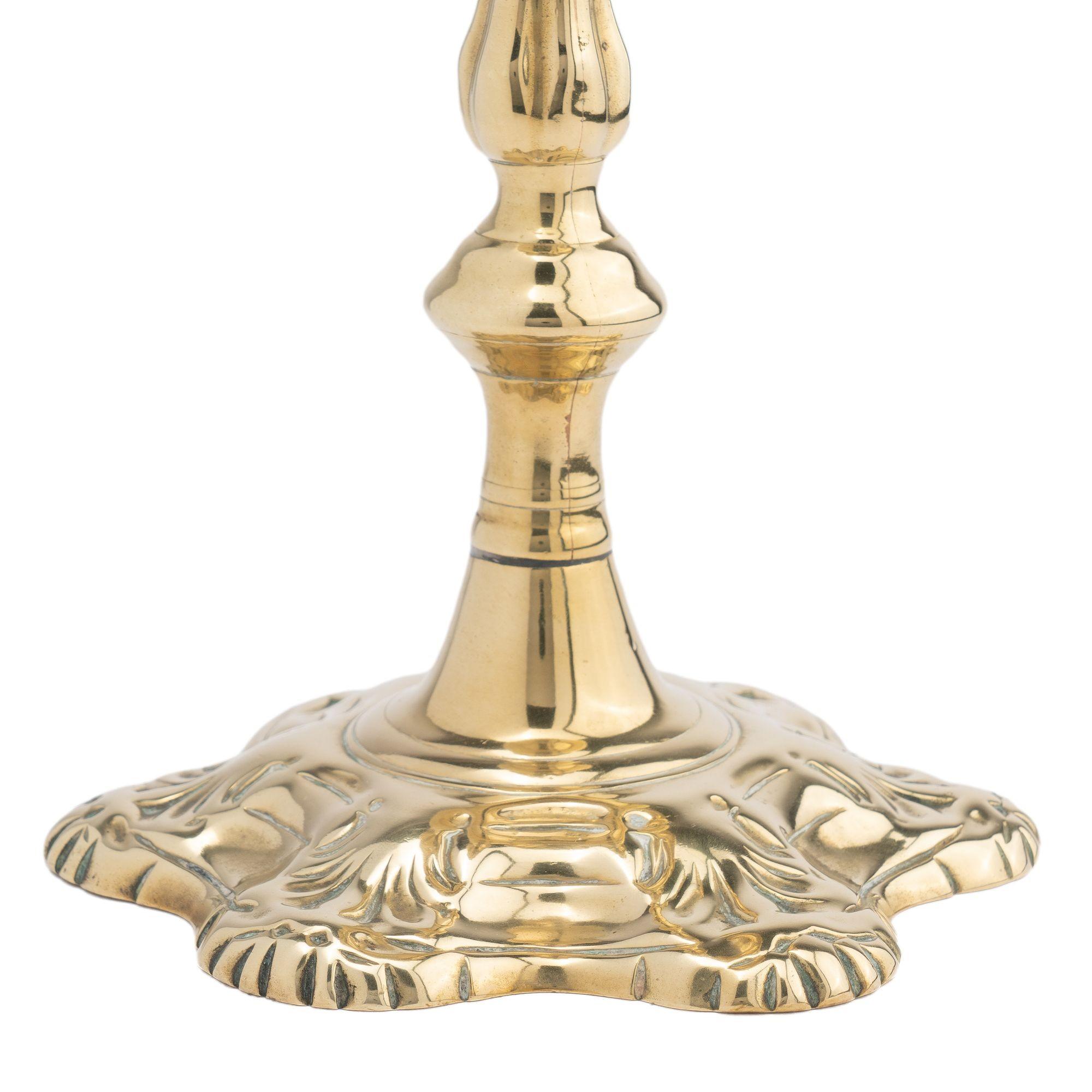 Brass English shell base Queen Anne candlestick, 1760 For Sale