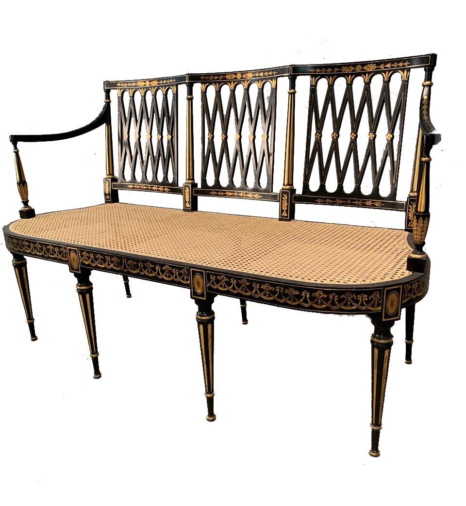 English Sheraton style (modern) black lacquered and gilt decorated loveseat having 3 open 