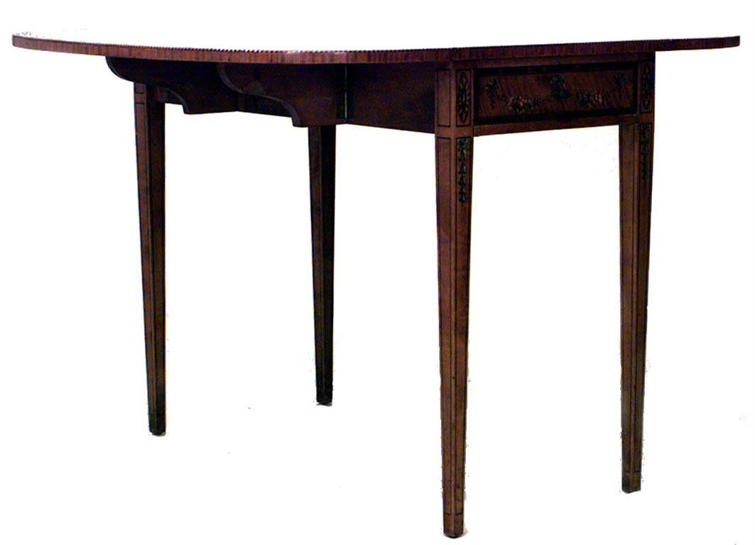 Late 19th-early 20th century English Sheraton style polychromed satinwood Pembroke table (end table) with a rosewood cross banded drop-leaf top over a frieze drawer and tapering square legs.