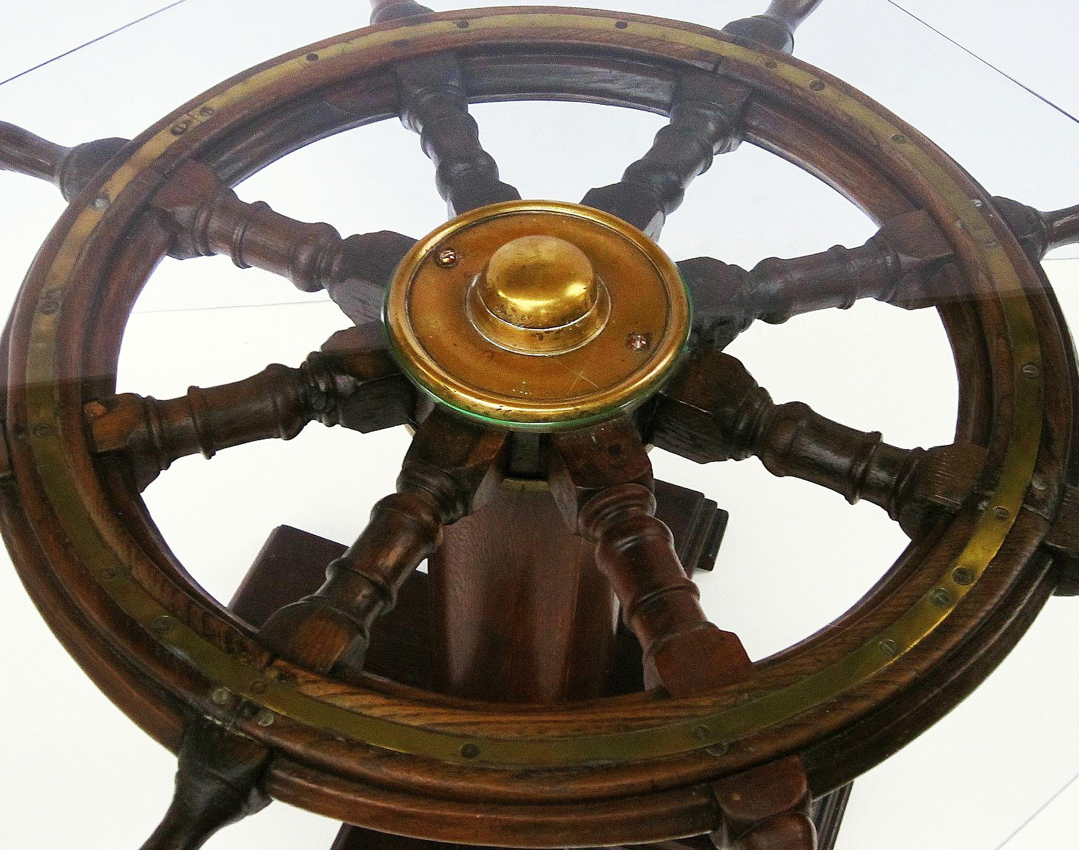 Metal English Ship's Wheel Table of Oak and Brass with Octagonal Glass Top