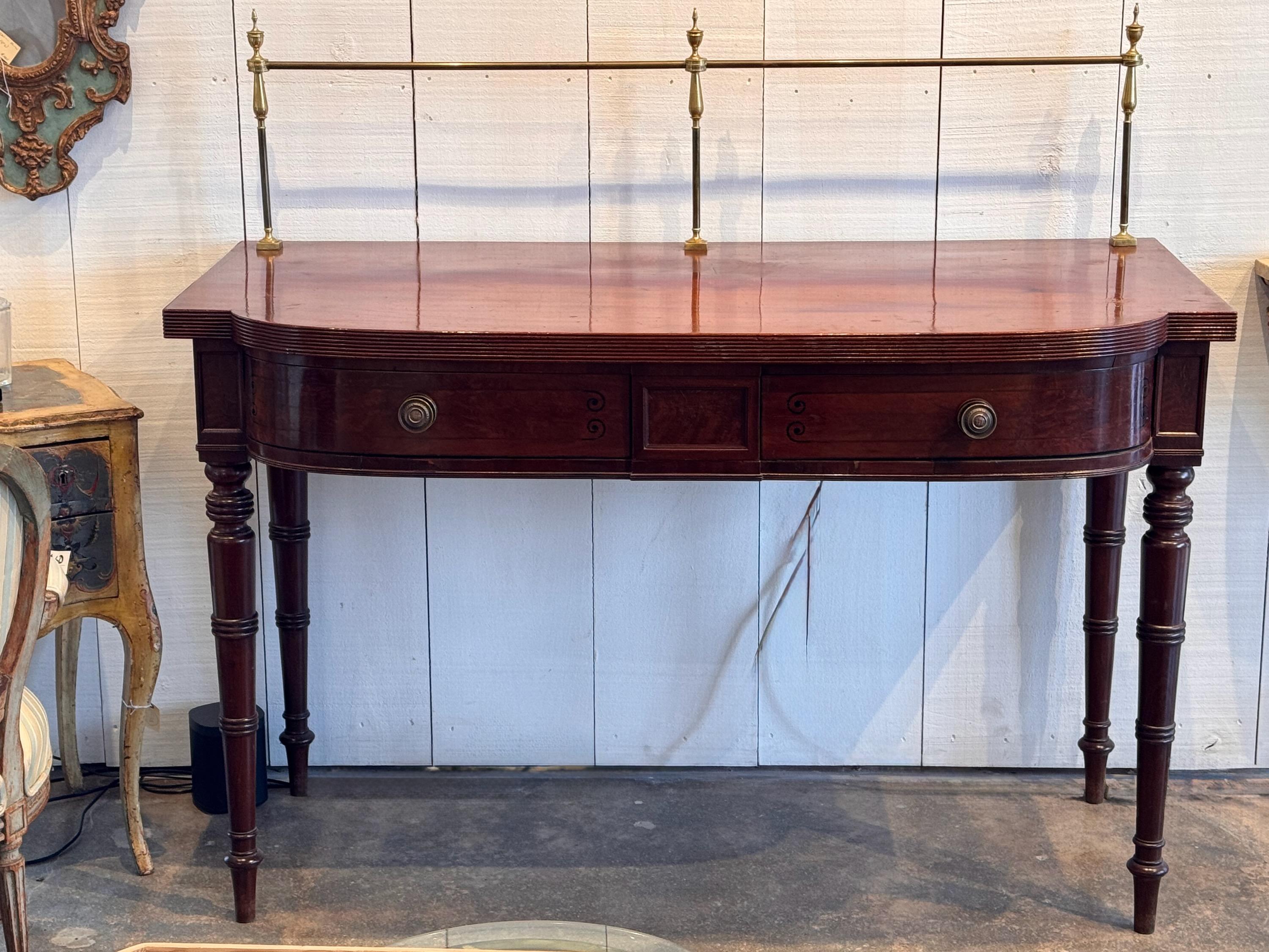 A beautiful English sideboard. It has a splash rail. That can be removed.