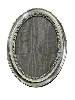 English silver picture frame attributed to Henry Matthews, 1922