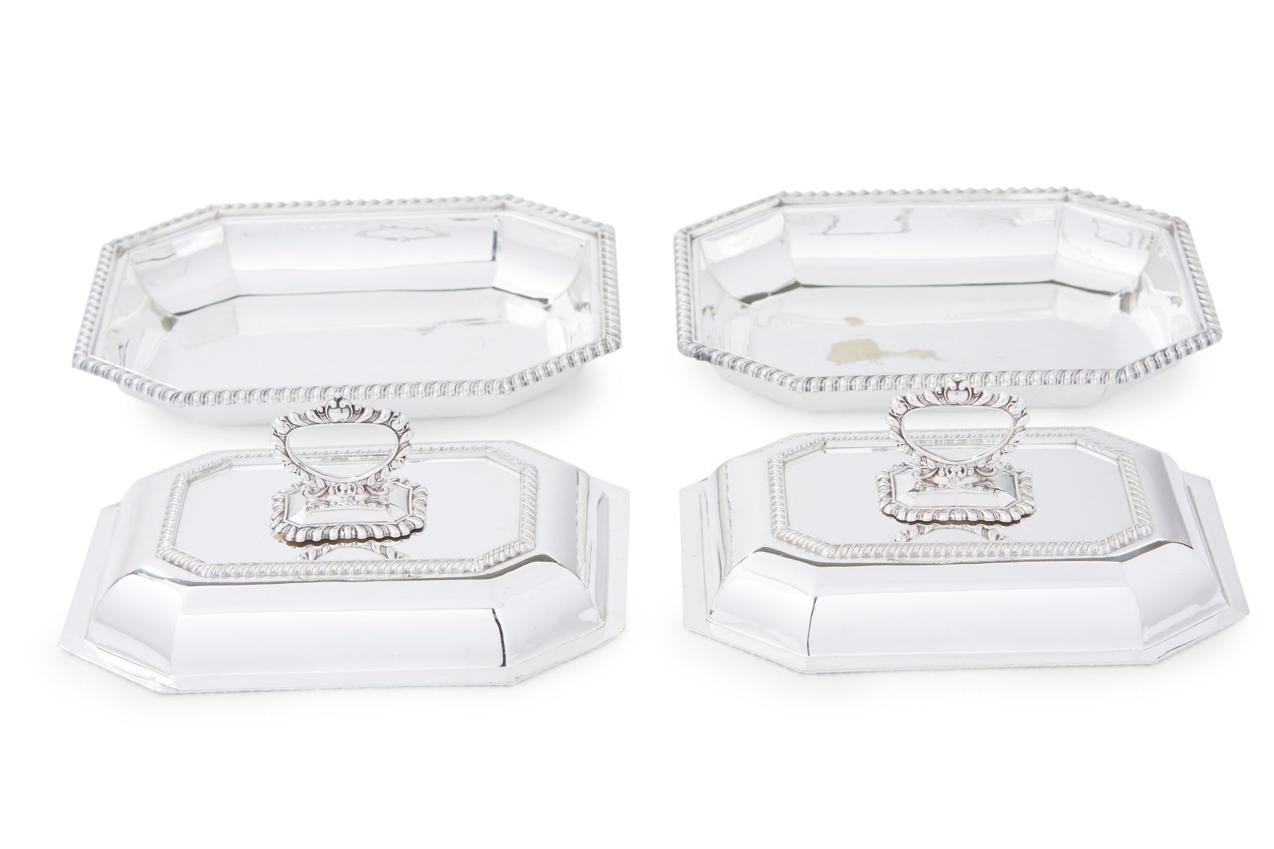 English silver plate pair of rectangular entrée dishes with detachable top handles and exterior cast bead borders design detail. The reversible tops can be used as separate open dishes. Great condition with minor wear. Maker's mark undersigned &