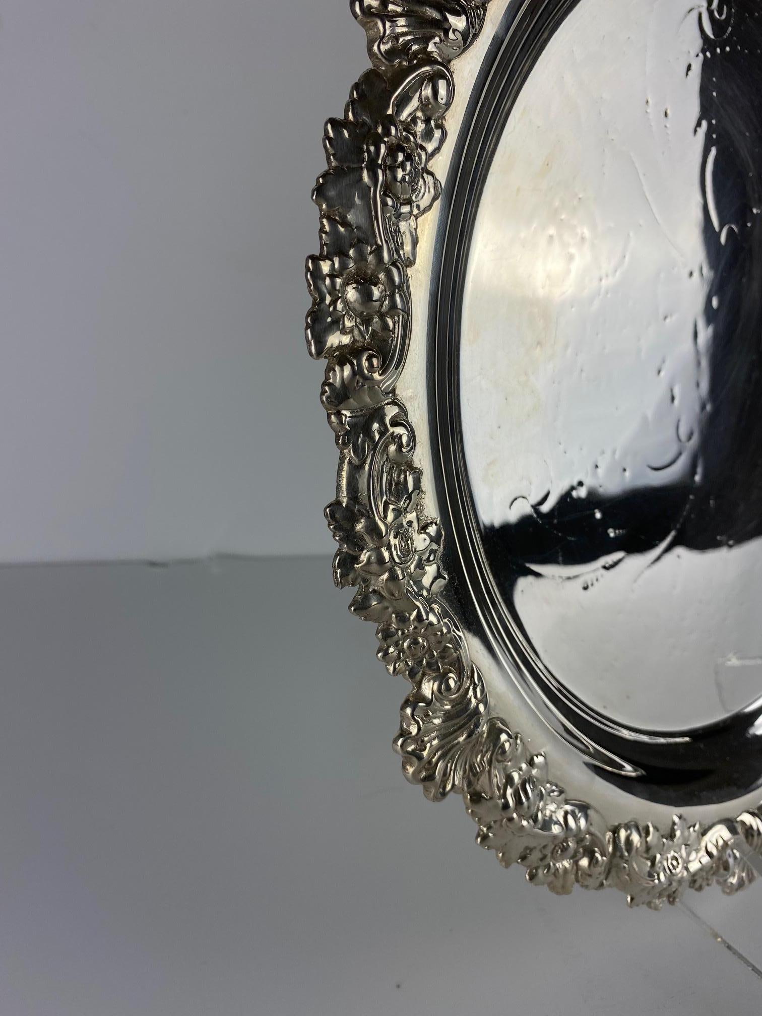 A round shaped English silver plate tray, circa 1940s.