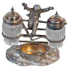 Antique English Silver Plated Cruet Set of Young Boy Leaping in the Air, circa 1873