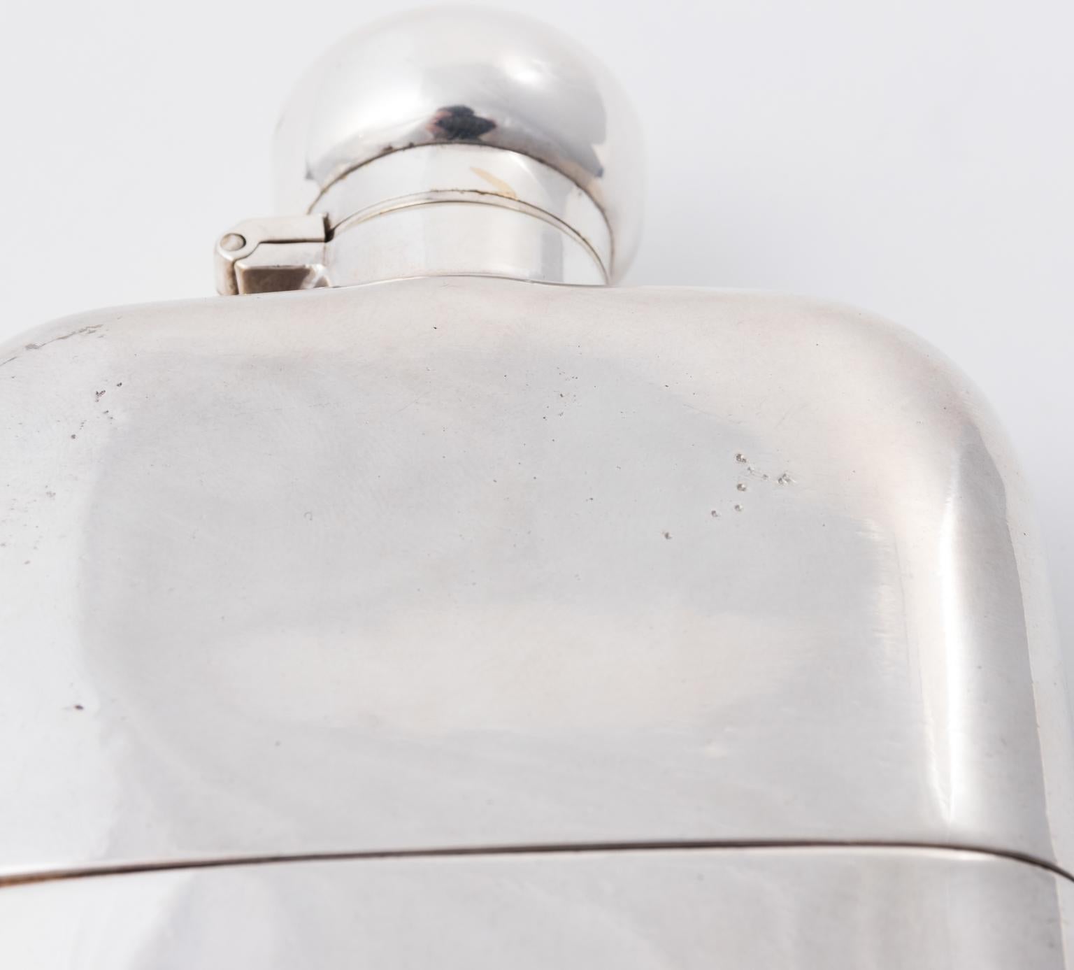 English silver plated flask with cup, circa 1930.
 